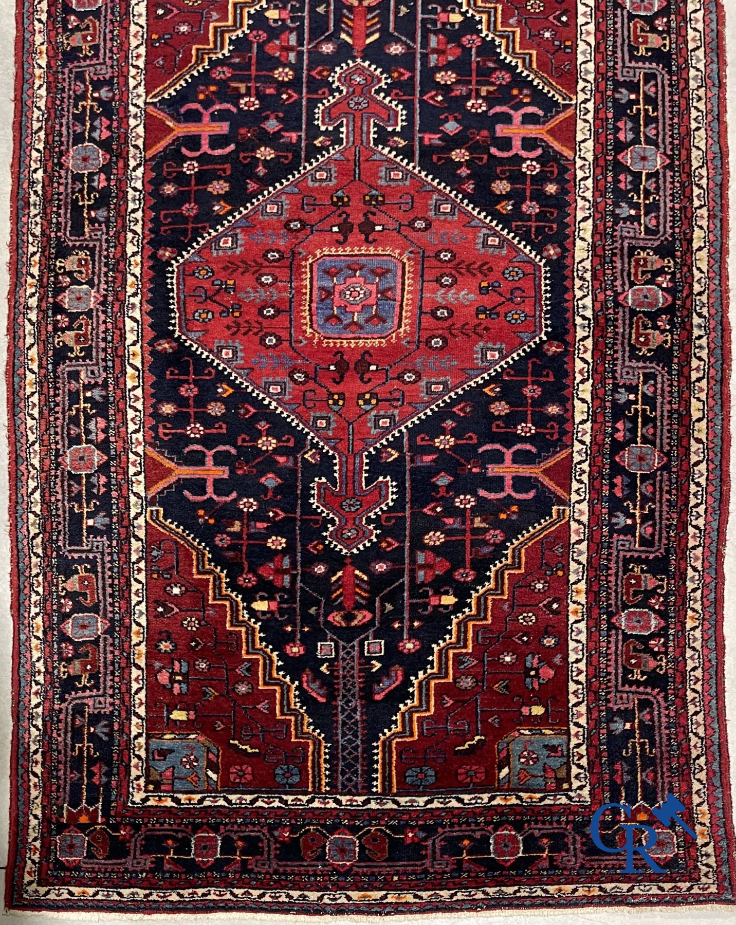 Oriental carpets: Oriental hand-knotted wool carpet.