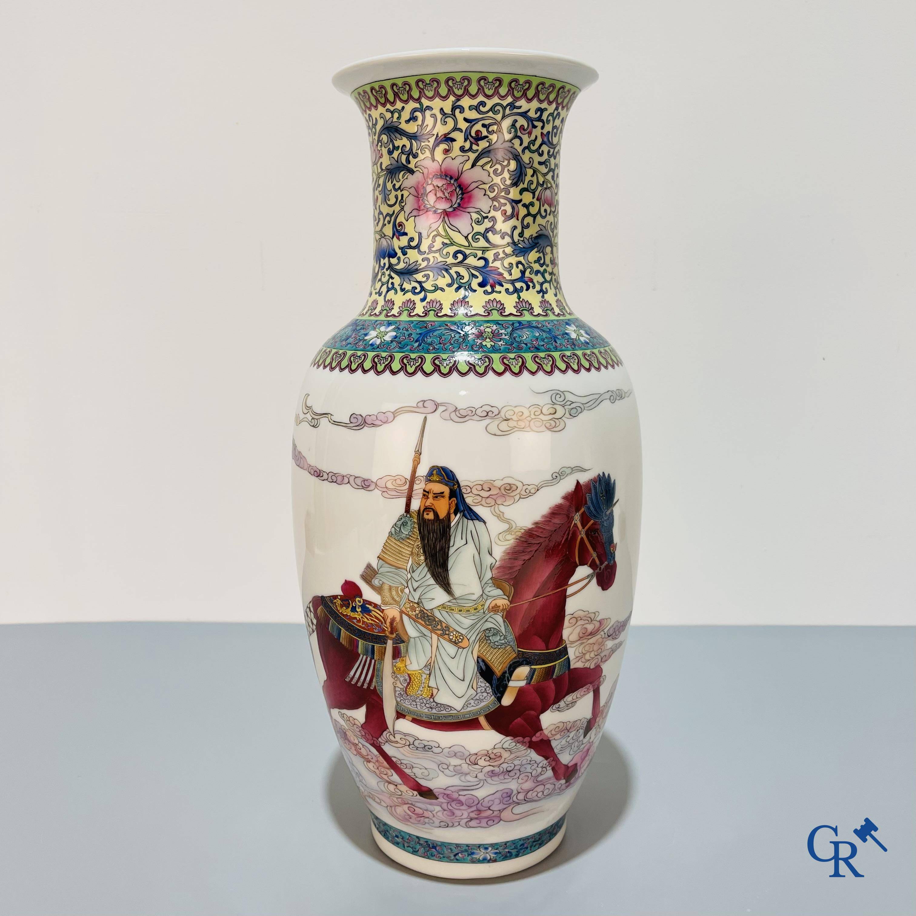 Asian Art, A finely decorated Chinese vase with a warrior on a horseback and calligraphy. Marked. 20th century.