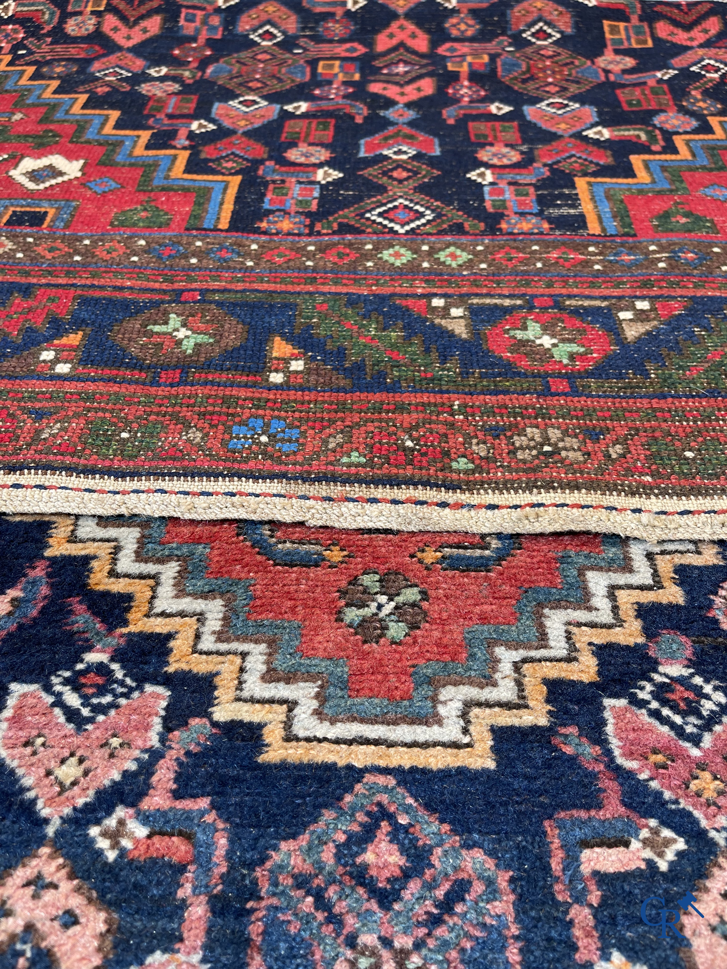 Oriental carpets, 2 antique hand-knotted Oriental carpets.