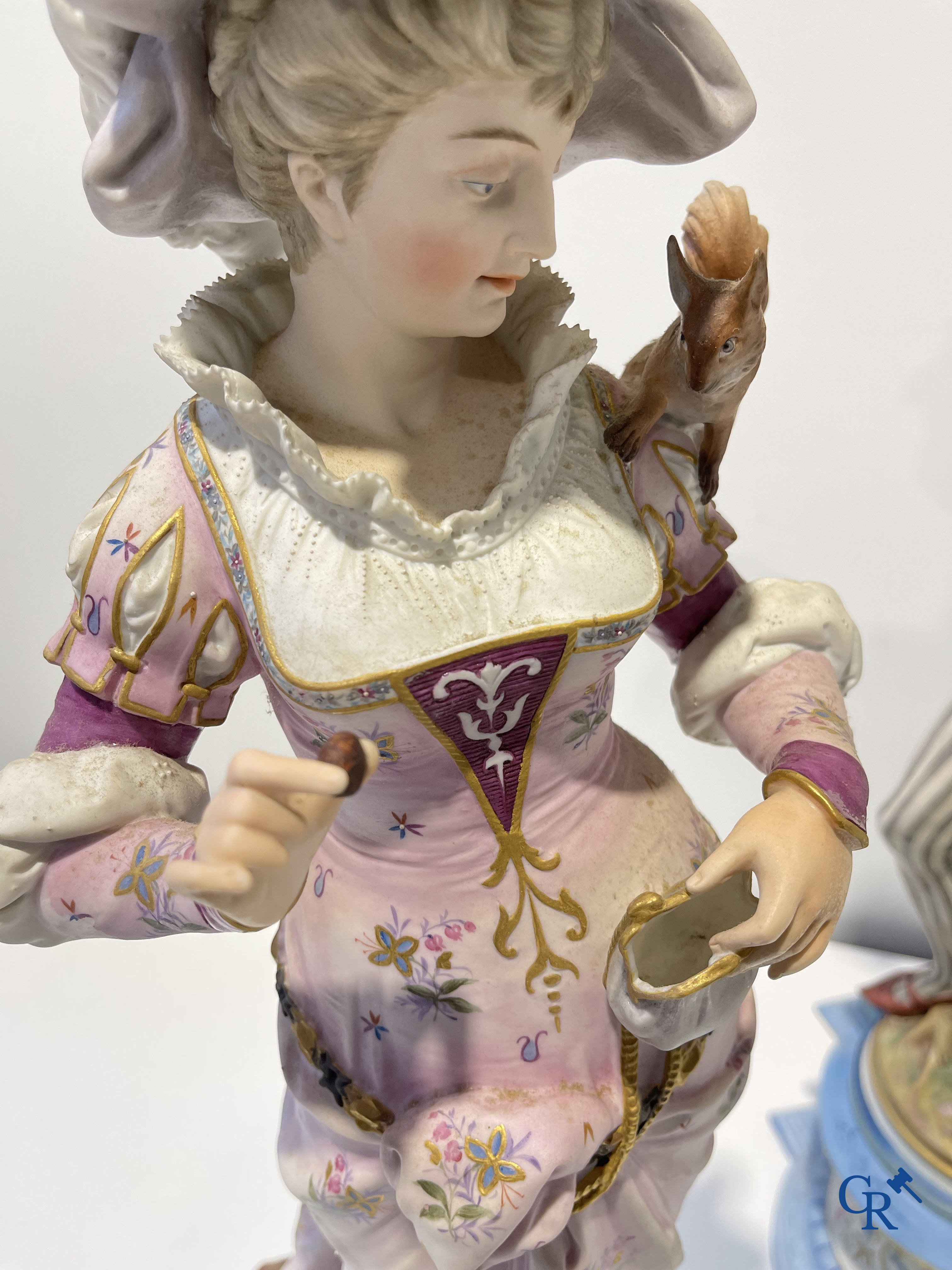 Exceptional pair of large statues in coloured and gilded biscuit porcelain. 2nd half of the 19th century.