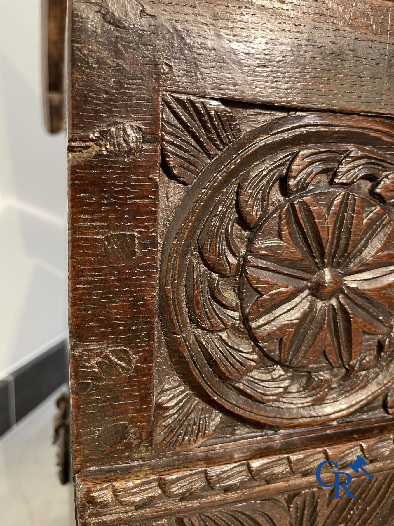 Furniture: Large sculpted oak chest. England, dated 1810.