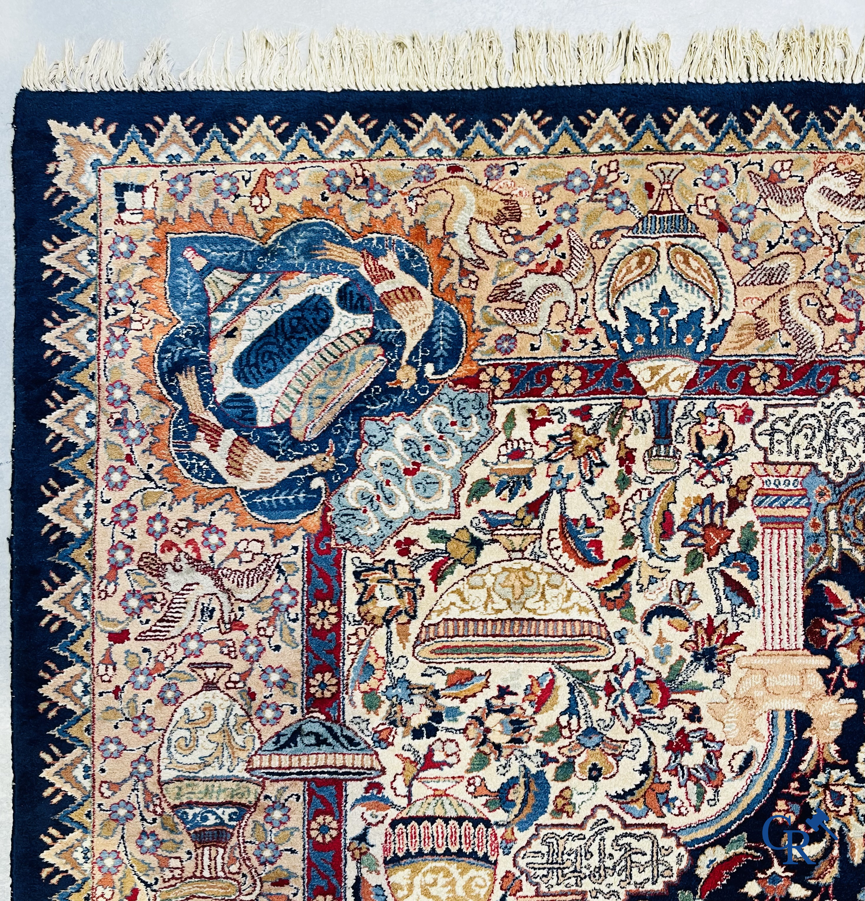 Oriental carpets: A large hand-knotted oriental carpet with antique decor. Multiple inscriptions.