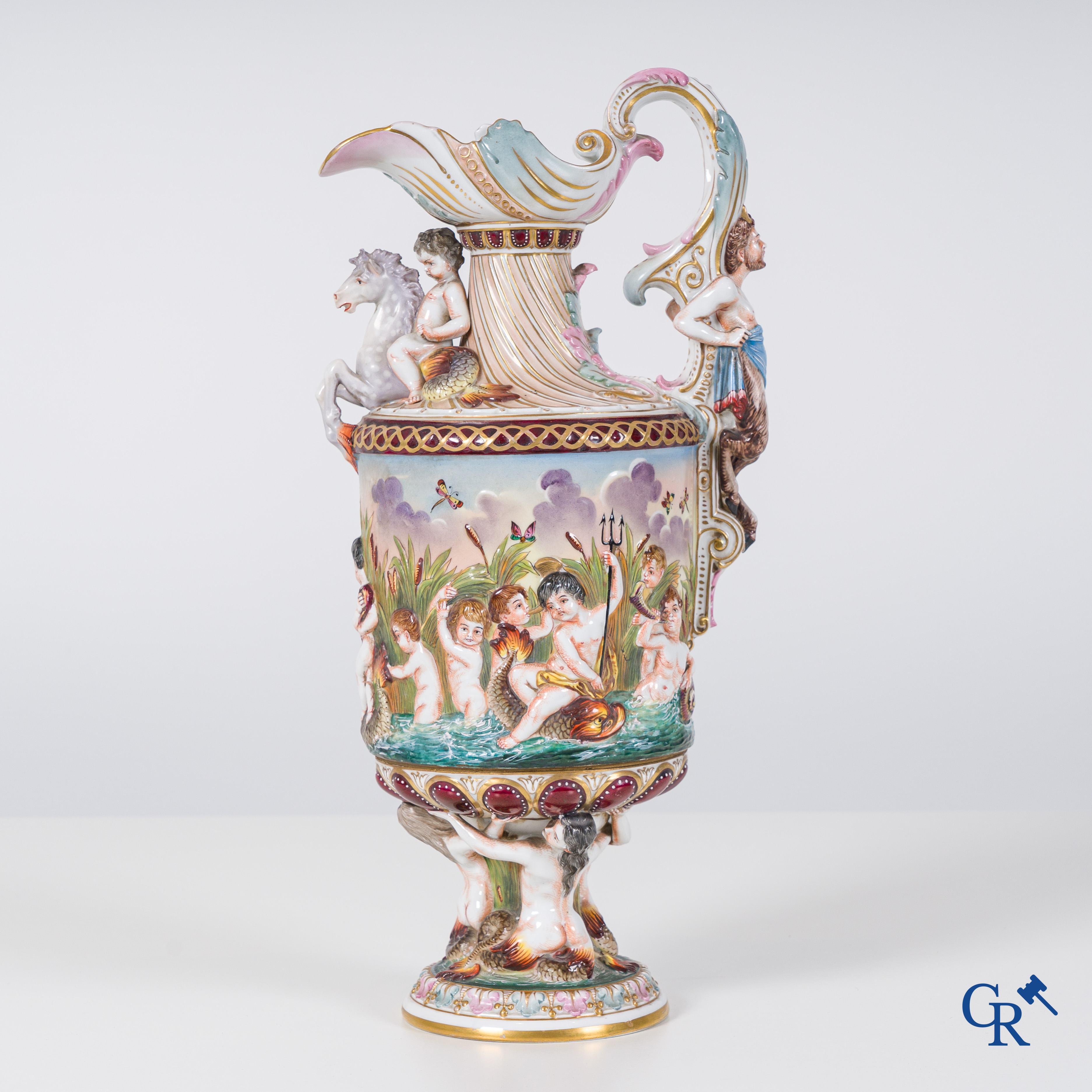 A richly crafted Renaissance-style jug or Aiguière in Naples porcelain. Late 19th century.