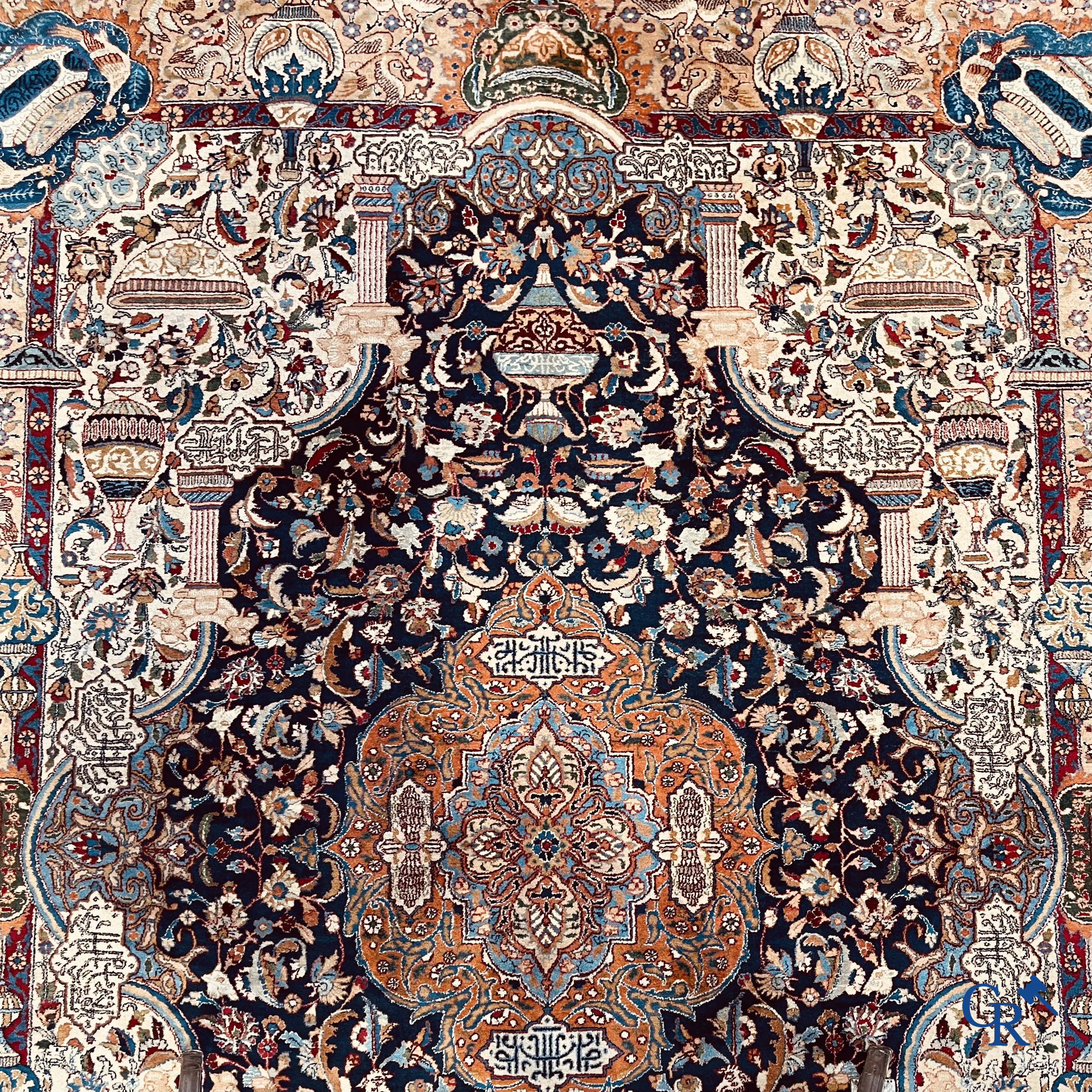 Oriental carpets: A large hand-knotted oriental carpet with antique decor. Multiple inscriptions.