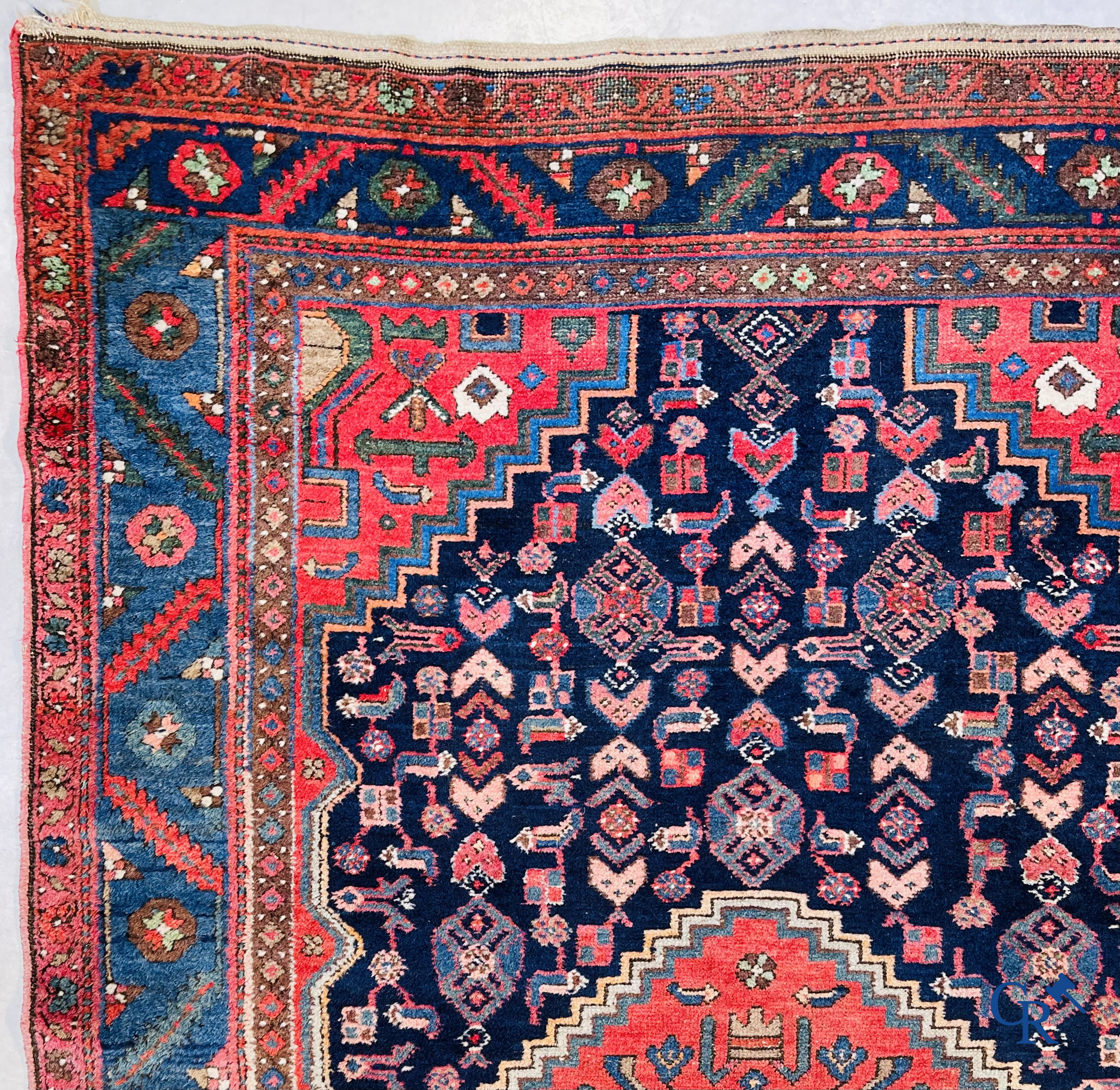 Oriental carpets, 2 antique hand-knotted Oriental carpets.