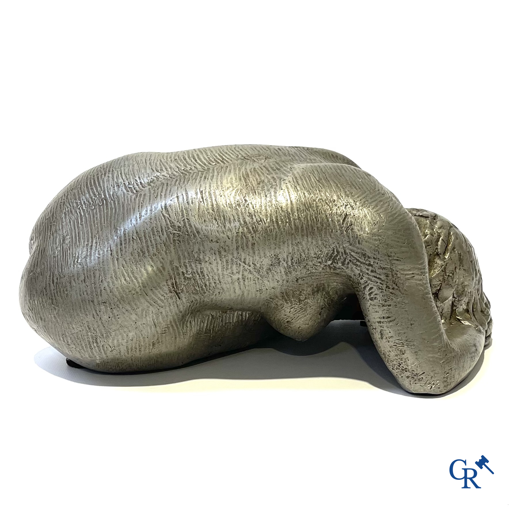 Irénée Duriez, Voorstelling van een liggend naakt in metaallegering. Gesigneerd en gedateerd I. Duriez '78.