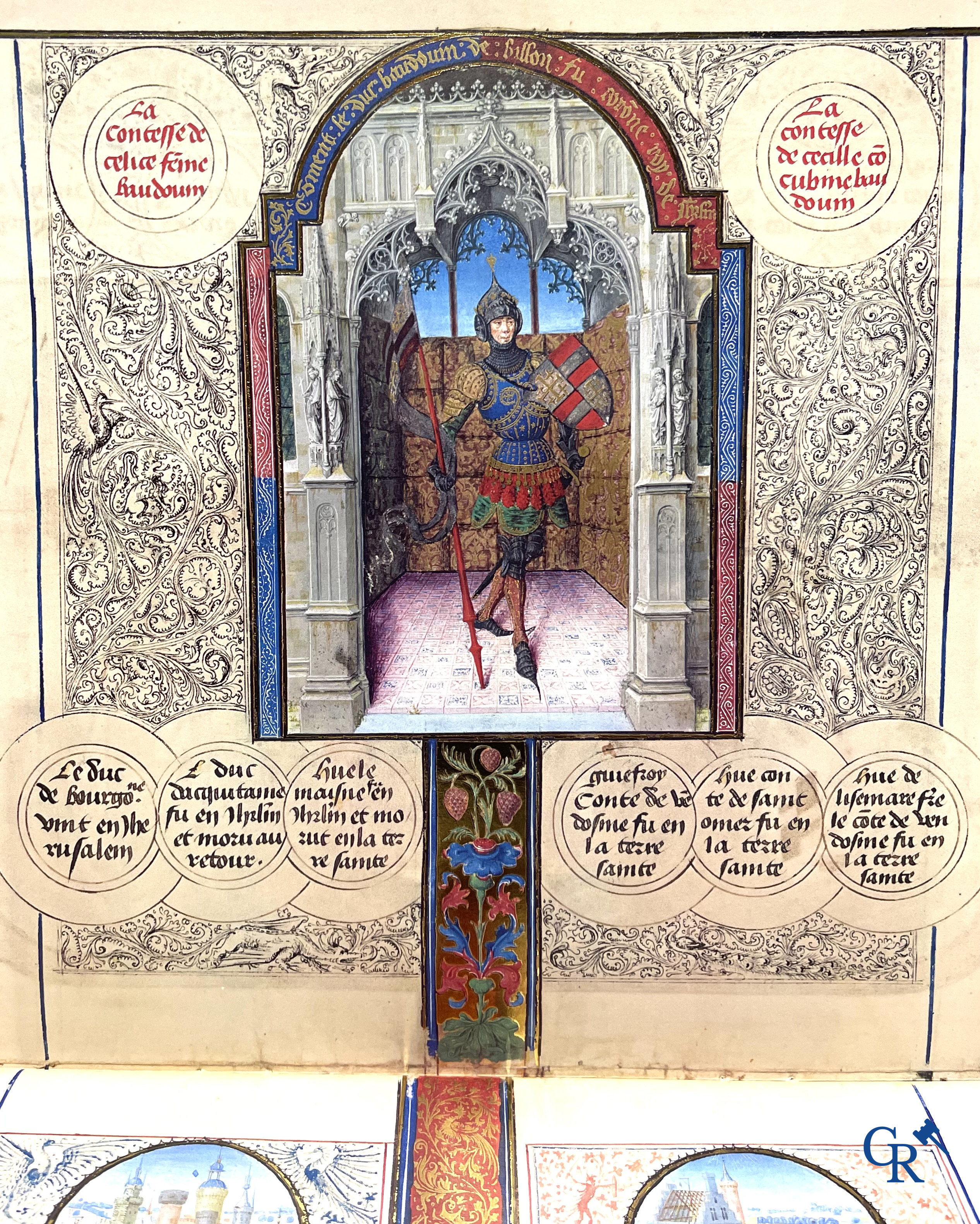 Groot lot kunstboeken, het Bénézit-woordenboek en een decoratieve moderne wereldbol.