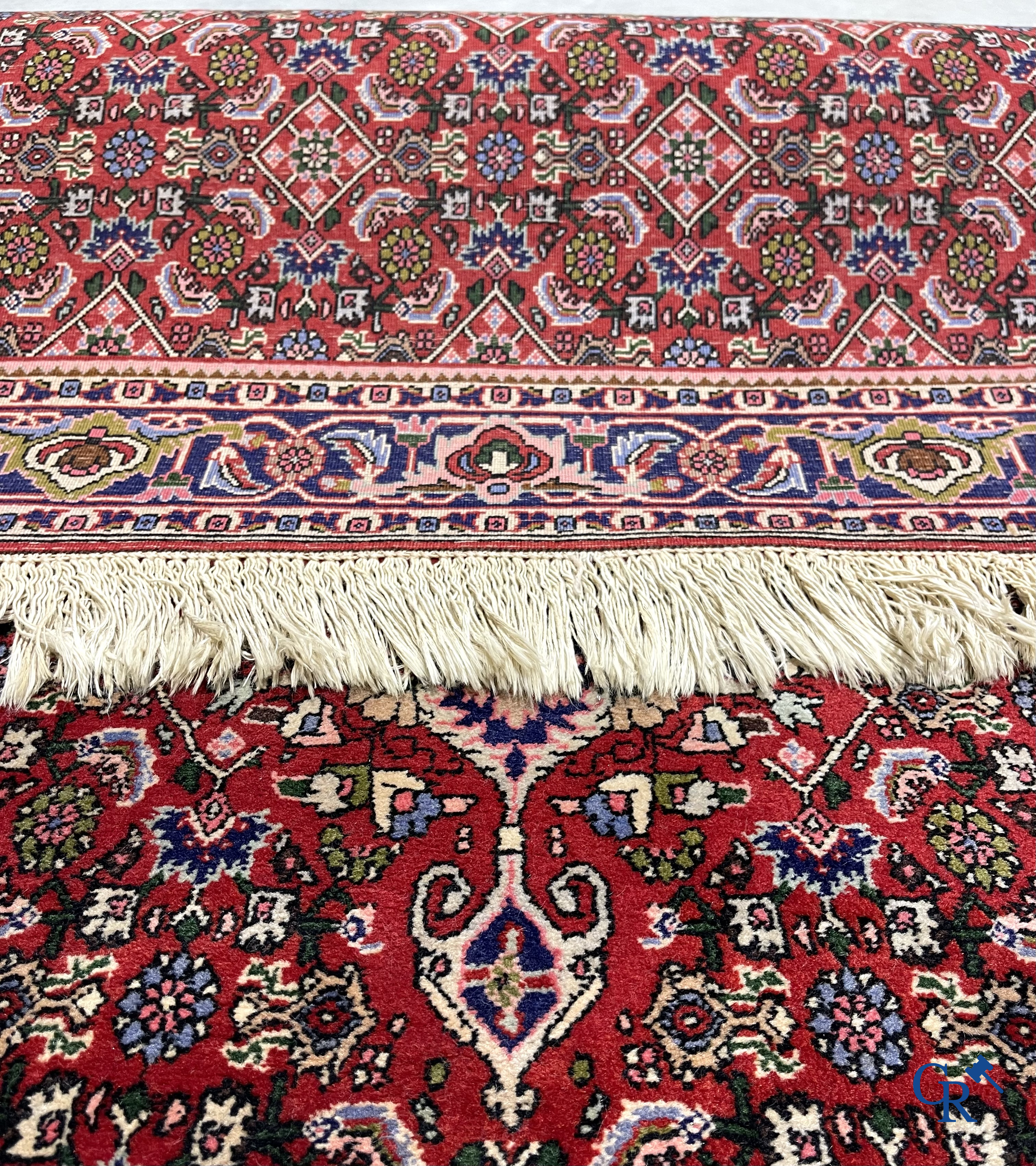 Oosterse tapijten. 2 handgeknoopte tapijten in wol.