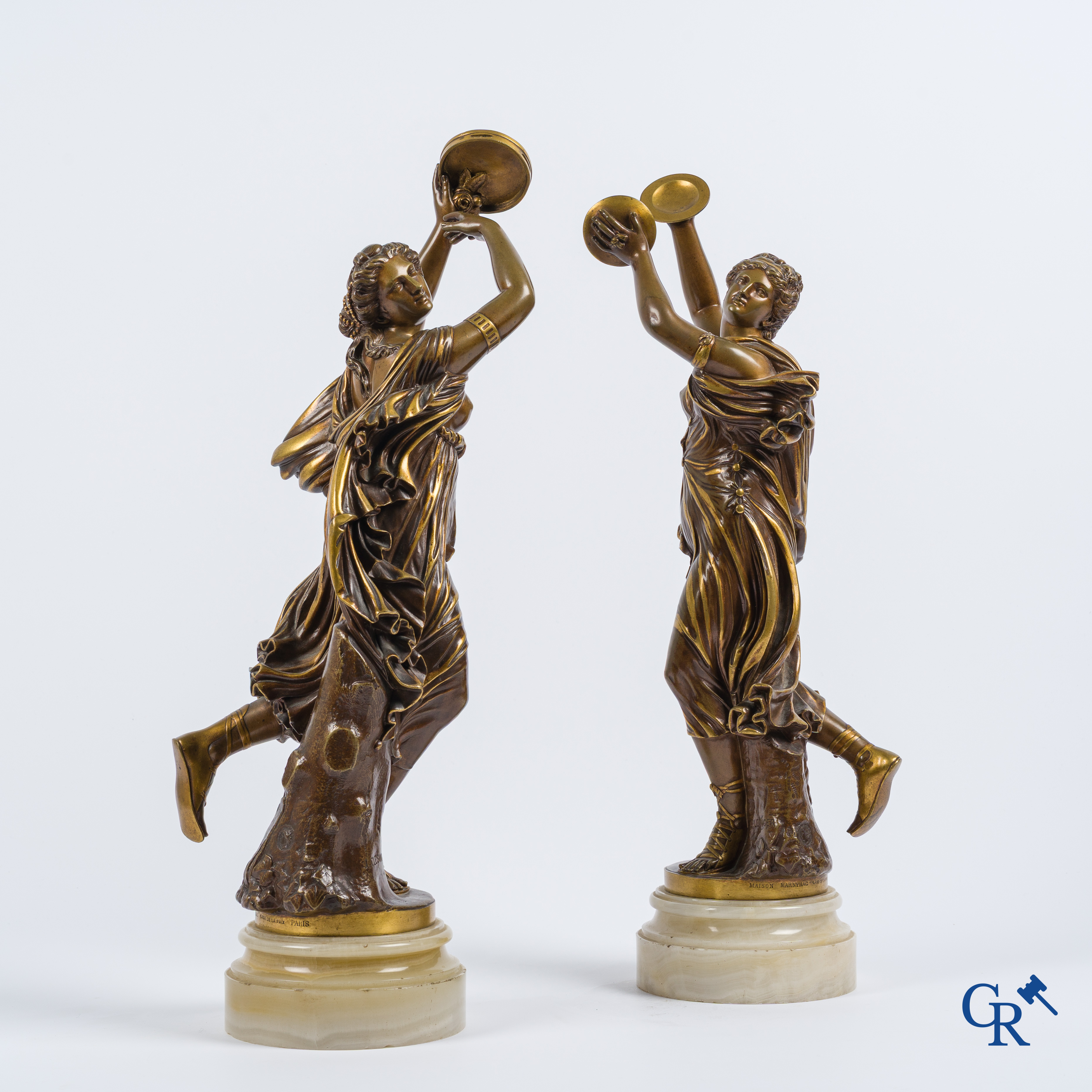 Jean-Baptiste Clésinger & Maison Marnyhac à Paris. Een paar bronzen beelden met bruine en vergulde patina. 19e eeuw.