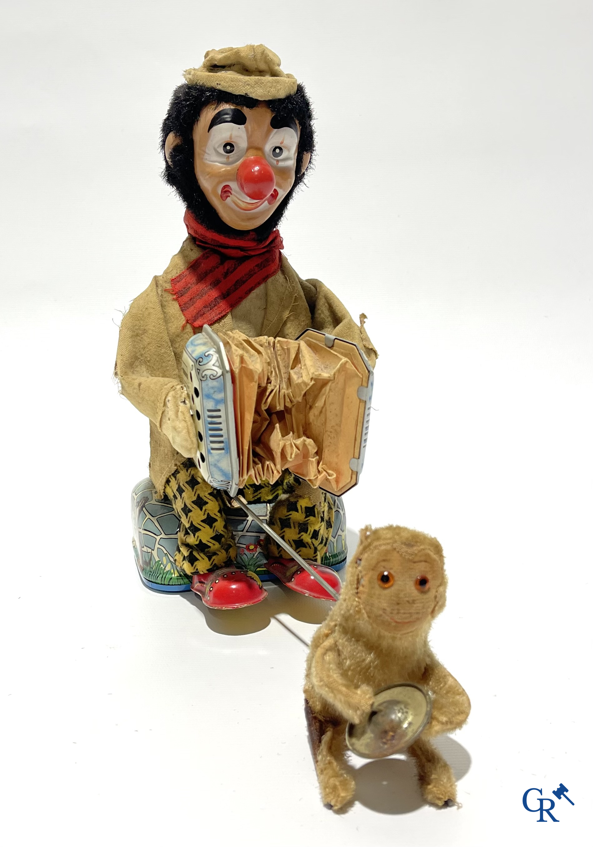 Oud Speelgoed. ALPS, Made in Japan. Battery toy in blik. Clown met accordeon en aapje. Jaren '60.