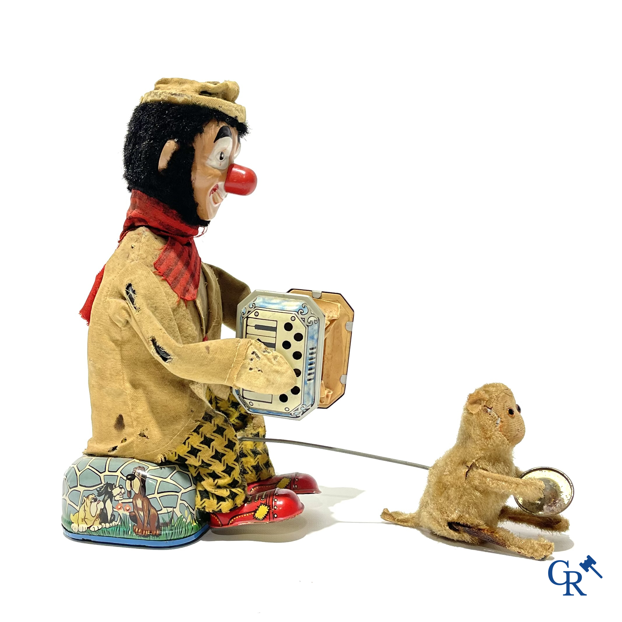 Oud Speelgoed. ALPS, Made in Japan. Battery toy in blik. Clown met accordeon en aapje. Jaren '60.