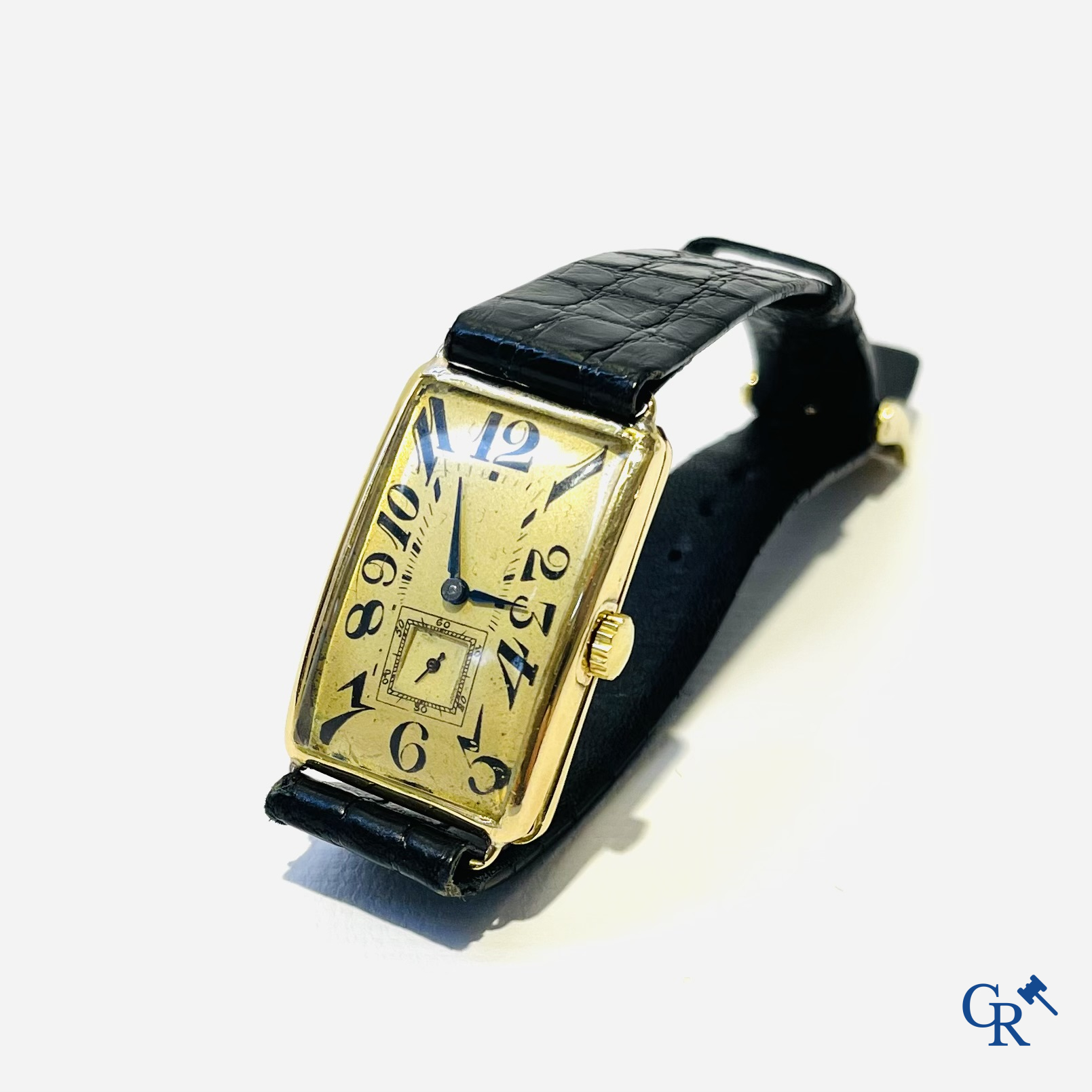 Heren polshorloge in geelgoud 750°/00. Genummerd 733459.