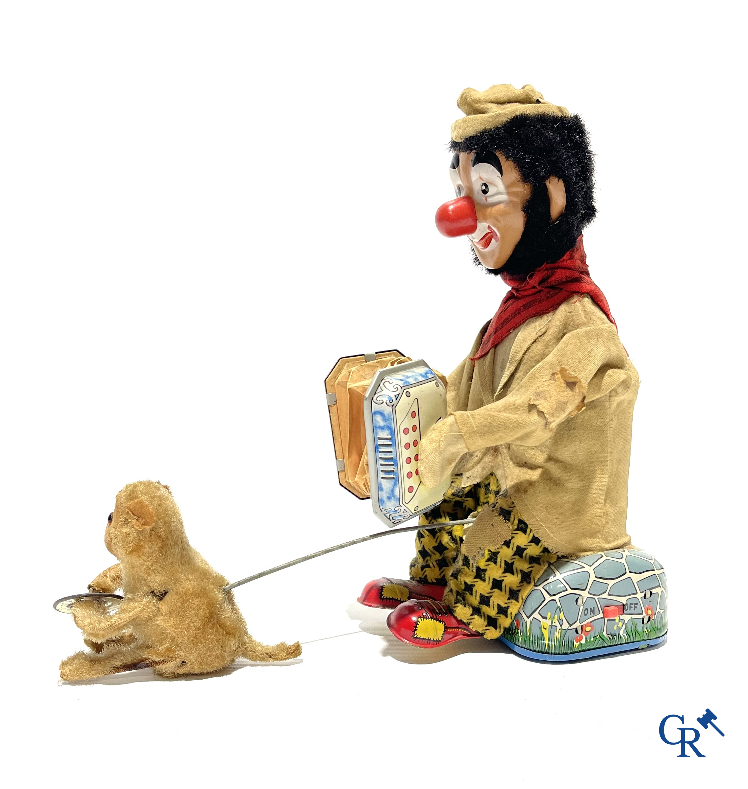 Oud Speelgoed. ALPS, Made in Japan. Battery toy in blik. Clown met accordeon en aapje. Jaren '60.