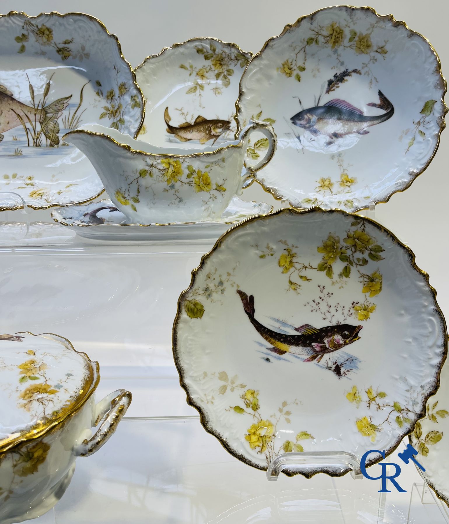 Extraordinary tableware in Brussels porcelain with a theme of freshwater fish.