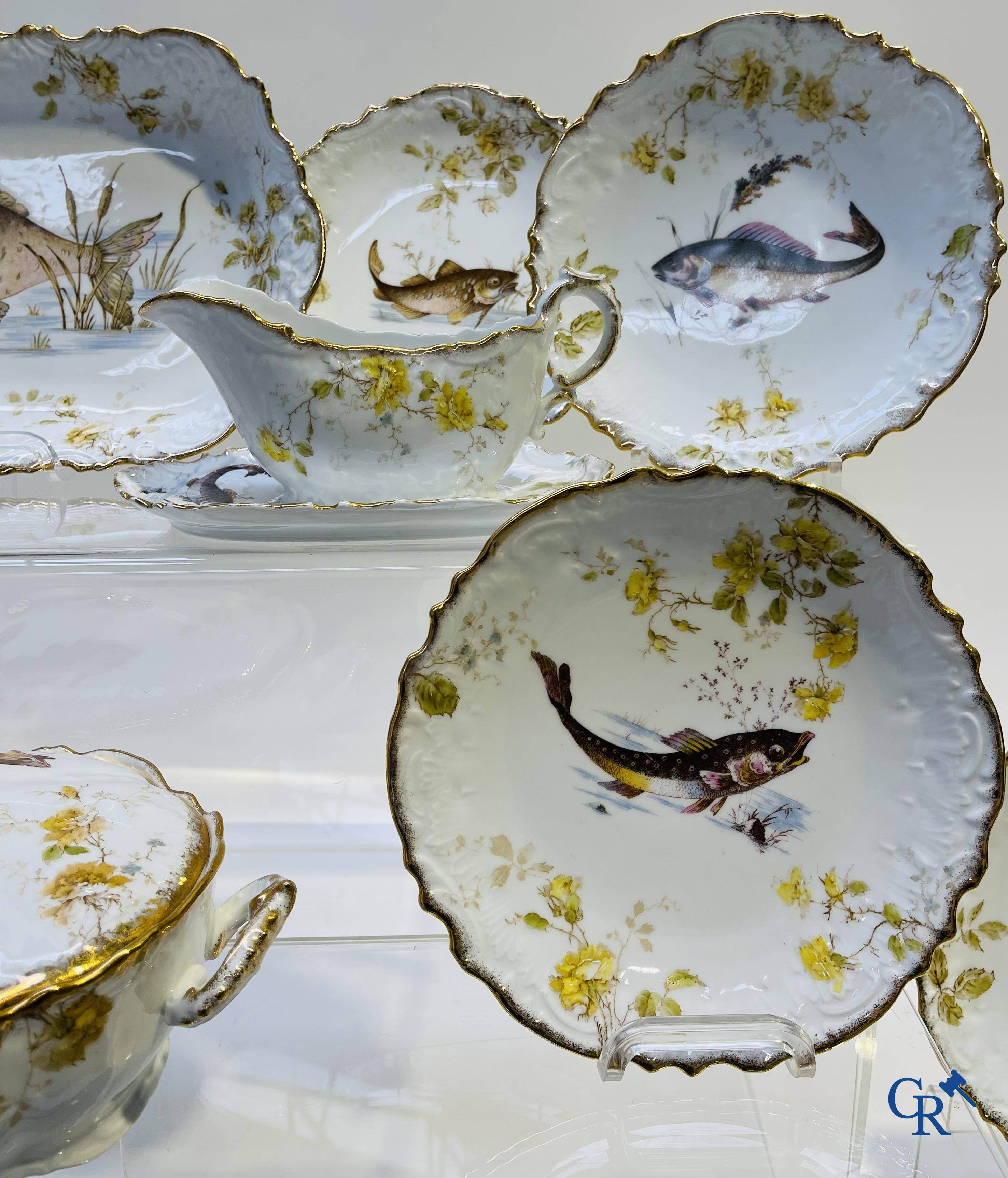 Extraordinary tableware in Brussels porcelain with a theme of freshwater fish.