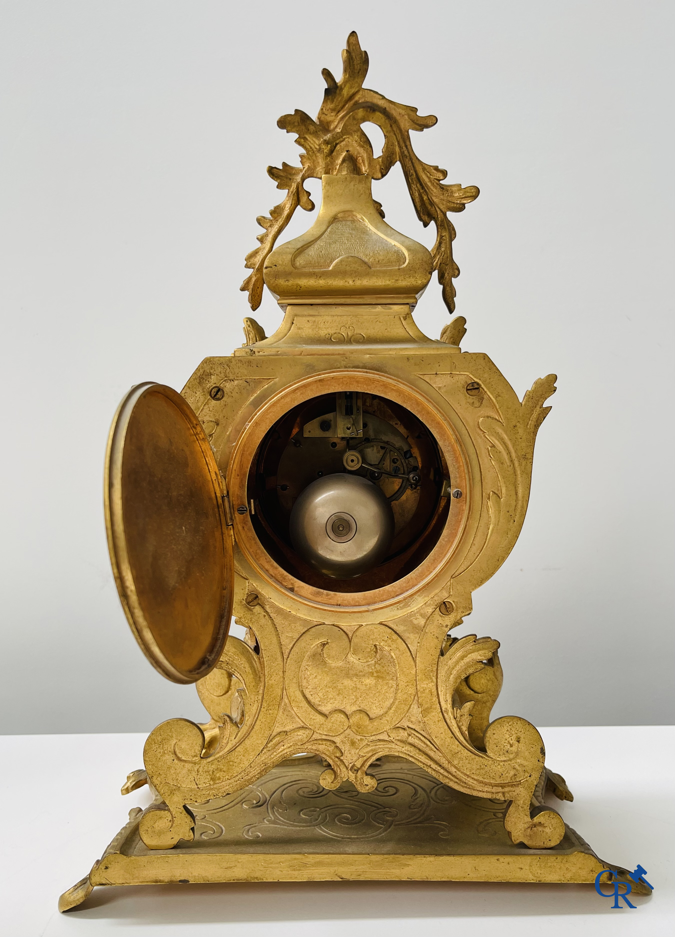 3-piece clock set in gilded bronze. Bronze dial with enamelled Roman numerals. LXV style. Period 1900.