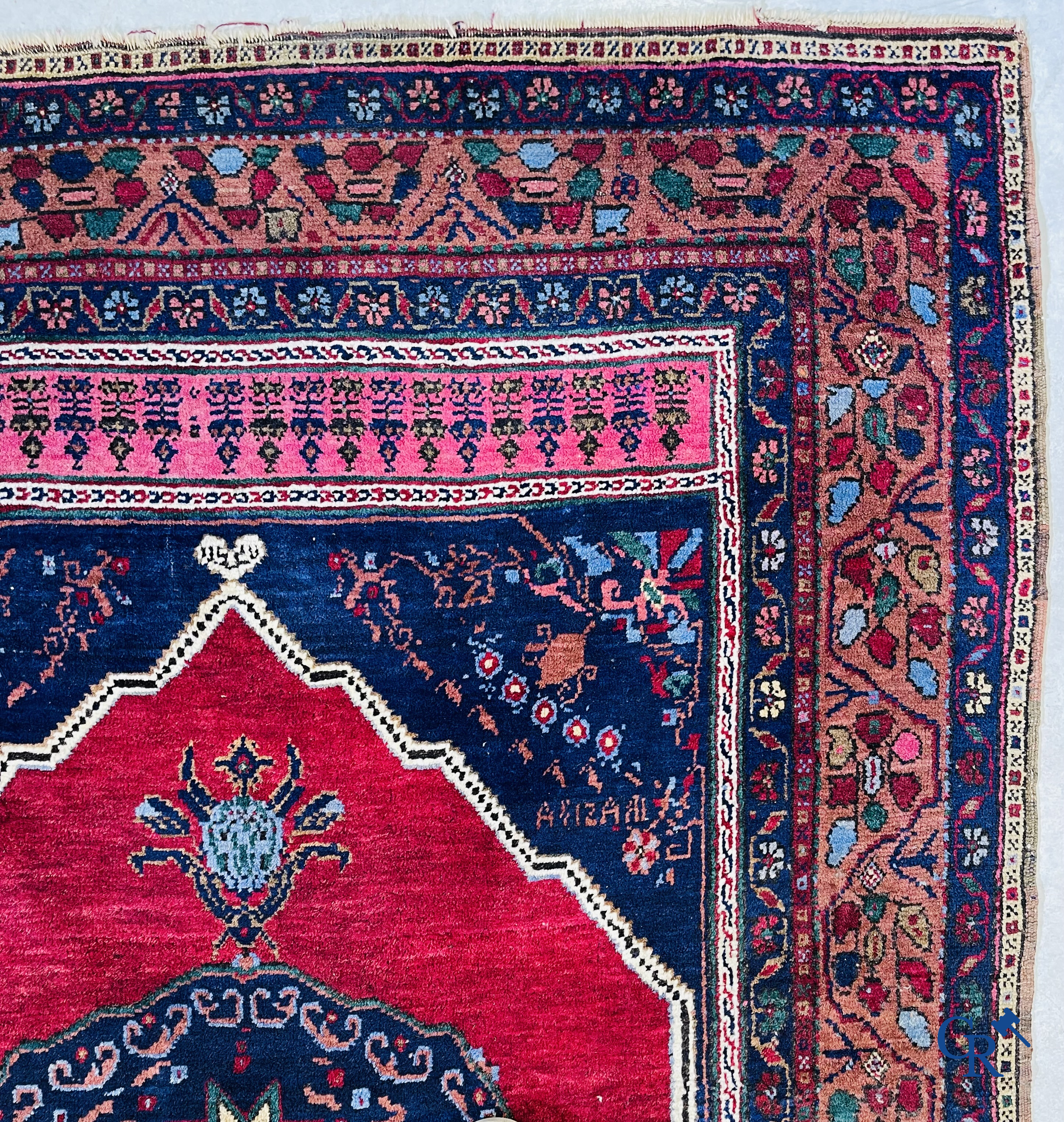 Oriental carpets, 2 antique hand-knotted Oriental carpets.