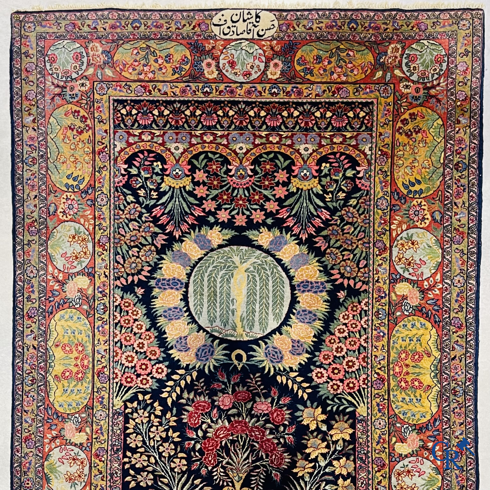 Oriental carpets: A finely knotted Oriental carpet with floral decor. Signed.