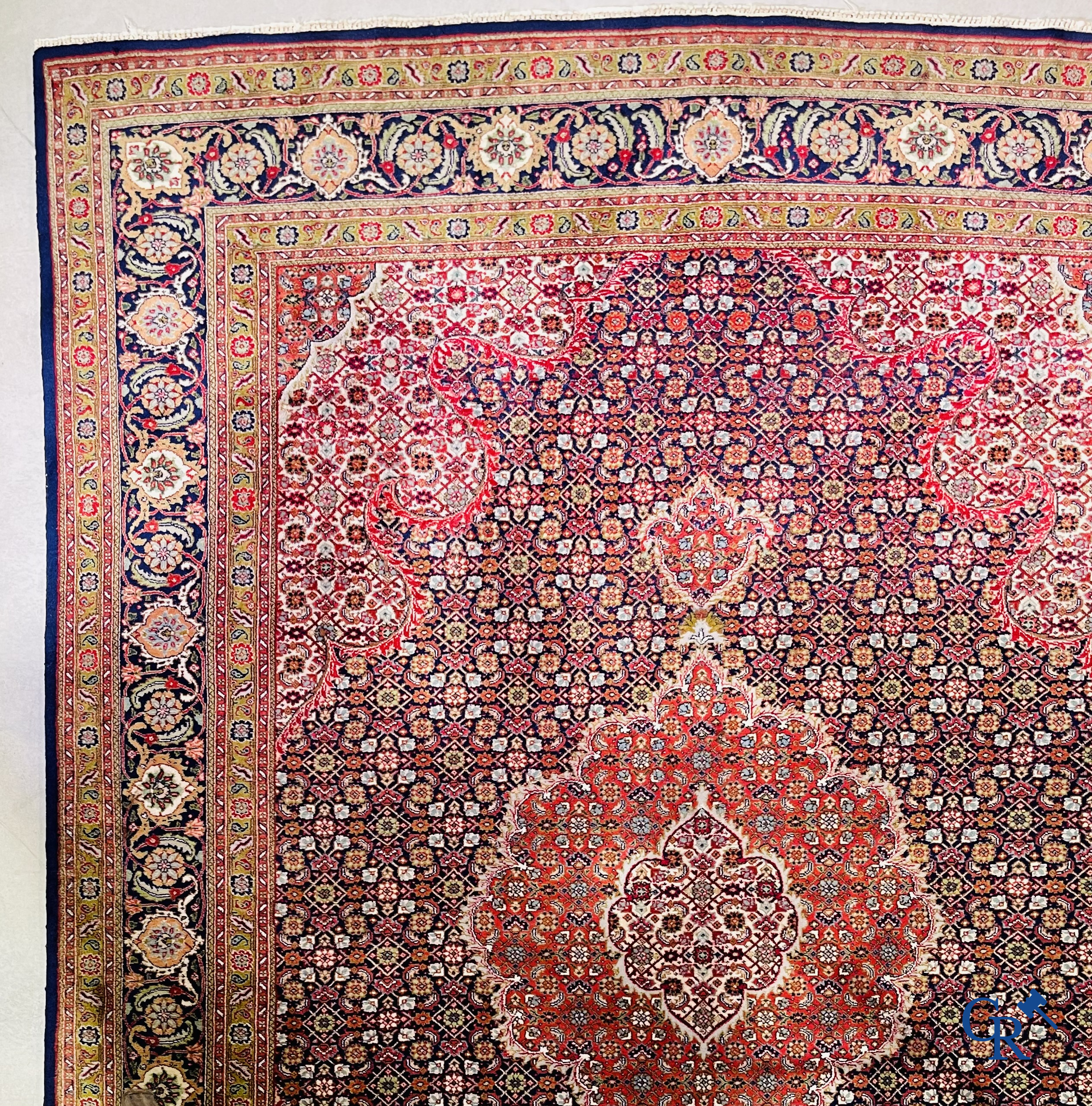 Oriental carpets: Tabriz, Iran. Large hand-knotted Persian carpet.