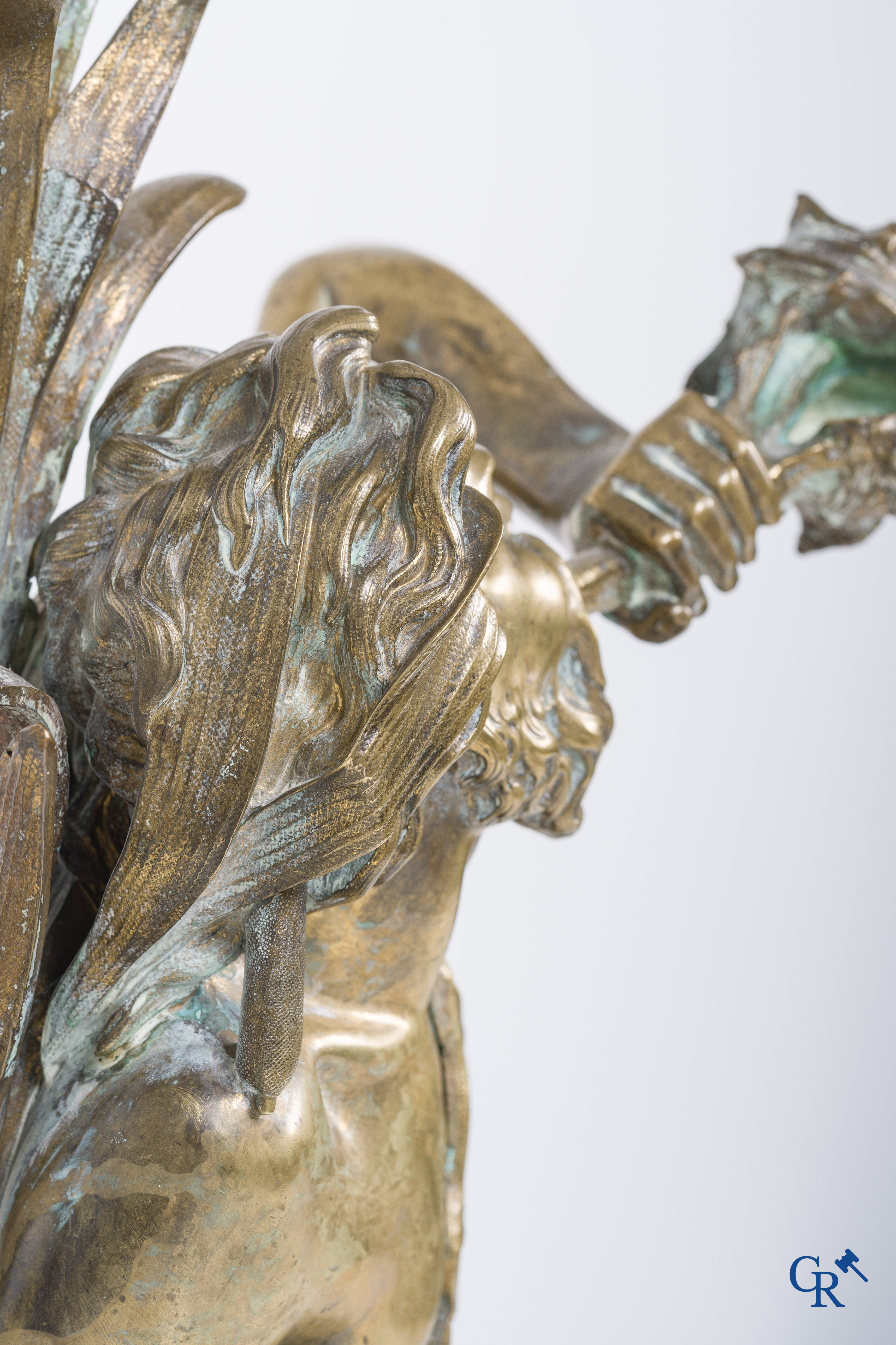 A large pair of finely chiseled bronze chenets with Tritons. Louis XV style. Napoleon III period.