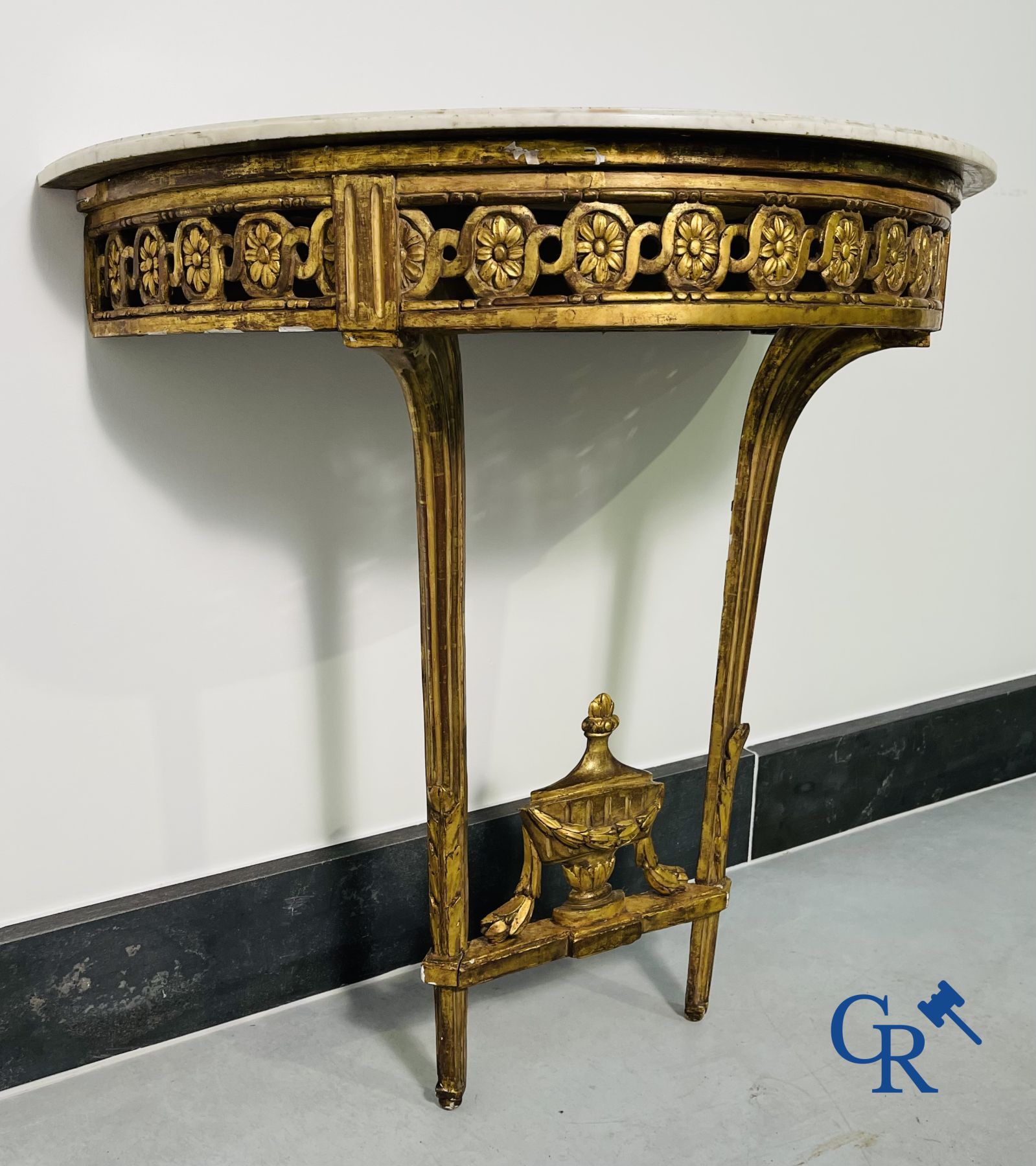 Furniture: Wood sculpted and gilded crescent shaped console. LXVI-period.