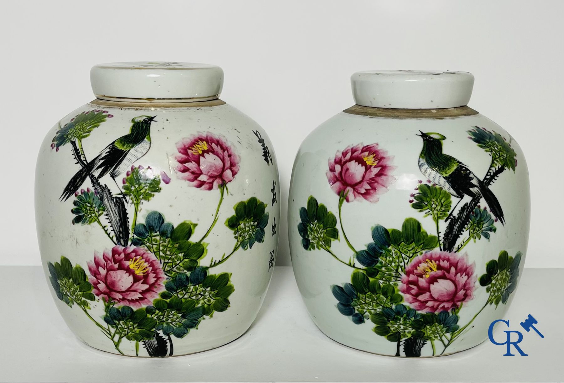 Chinese porcelain: a blue and white lid vase and a few ginger jars.