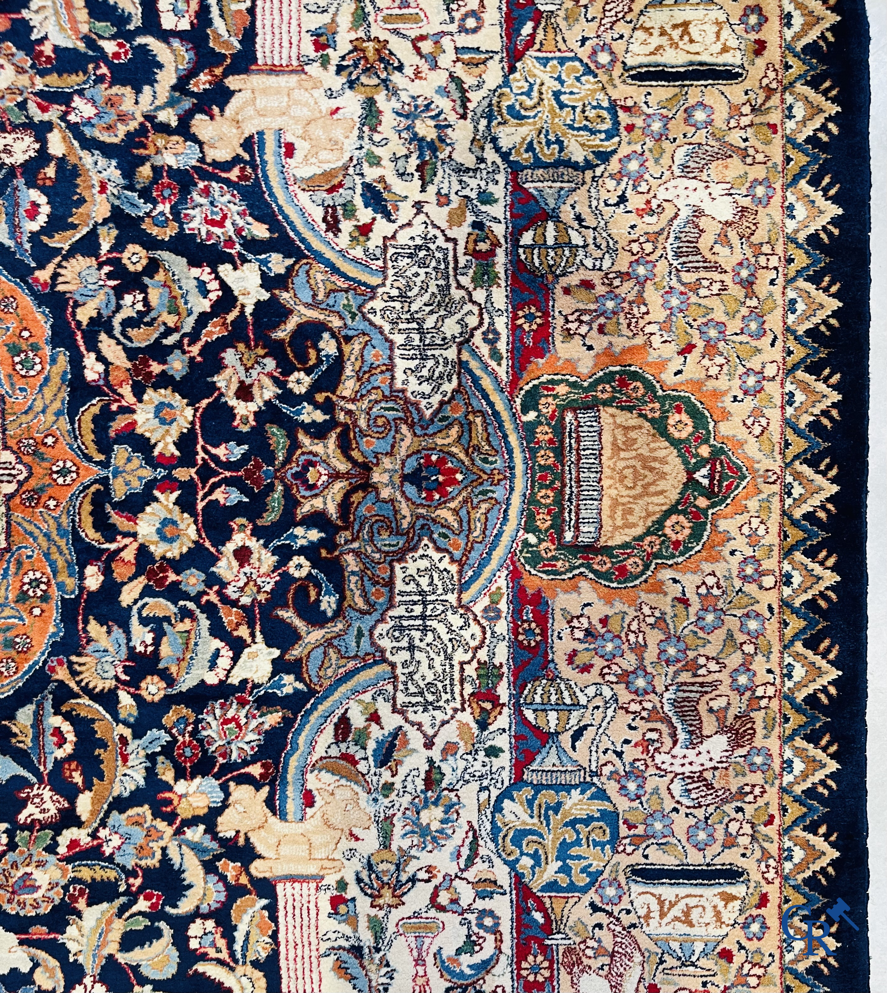 Oriental carpets: A large hand-knotted oriental carpet with antique decor. Multiple inscriptions.