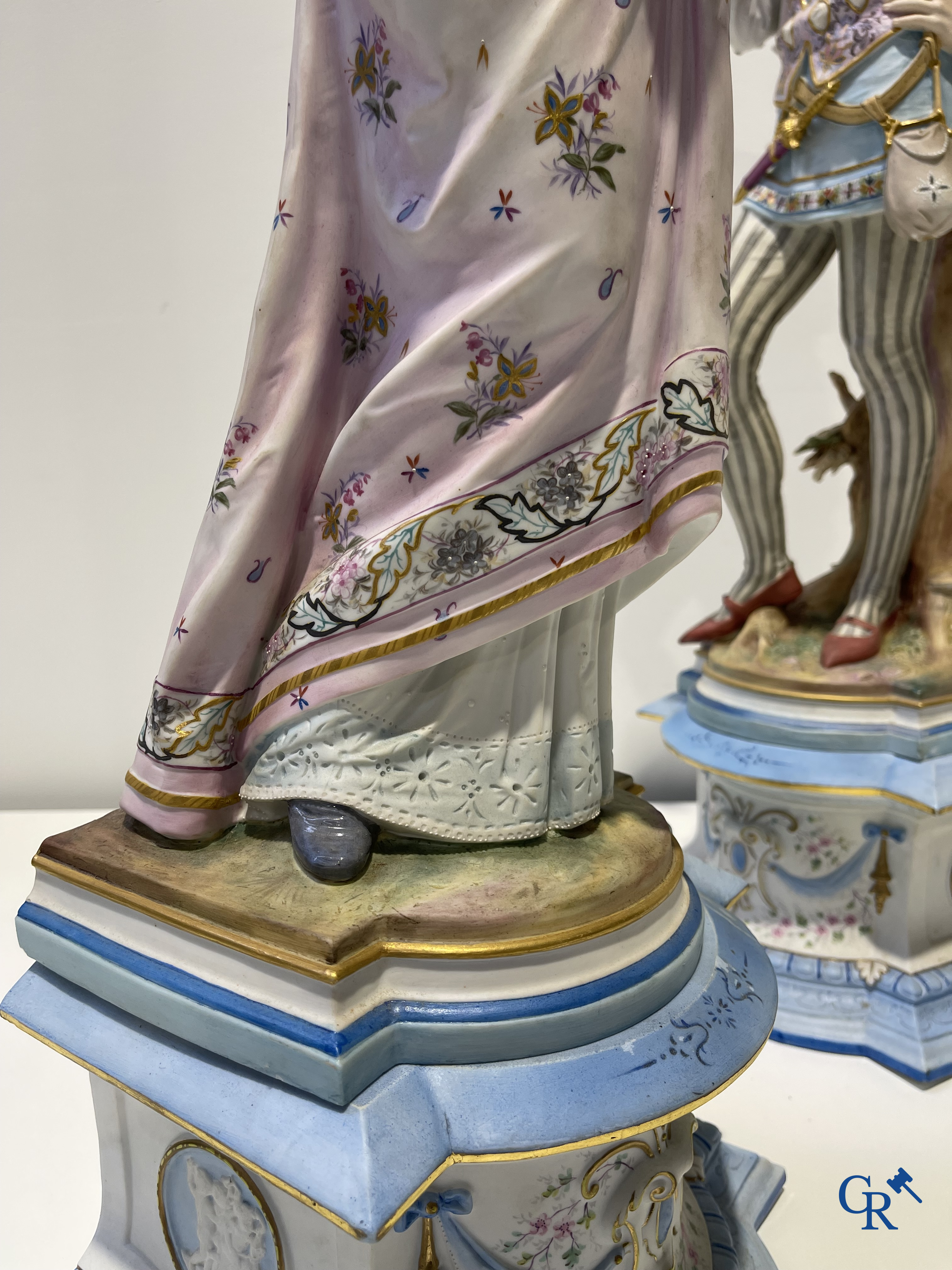 Exceptional pair of large statues in coloured and gilded biscuit porcelain. 2nd half of the 19th century.