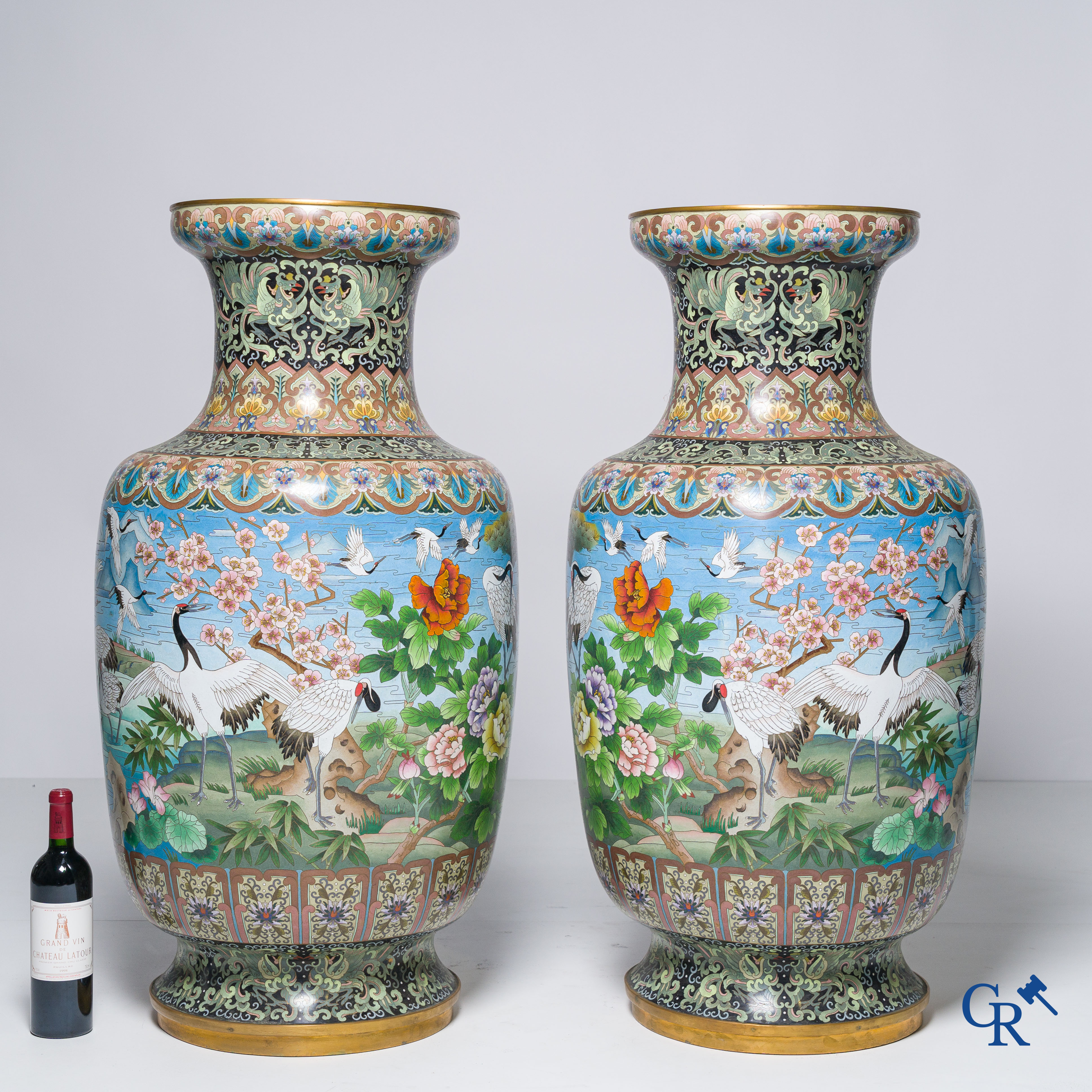 Asian Art, a massive pair of cloisonné vases with cranes. 20th century.