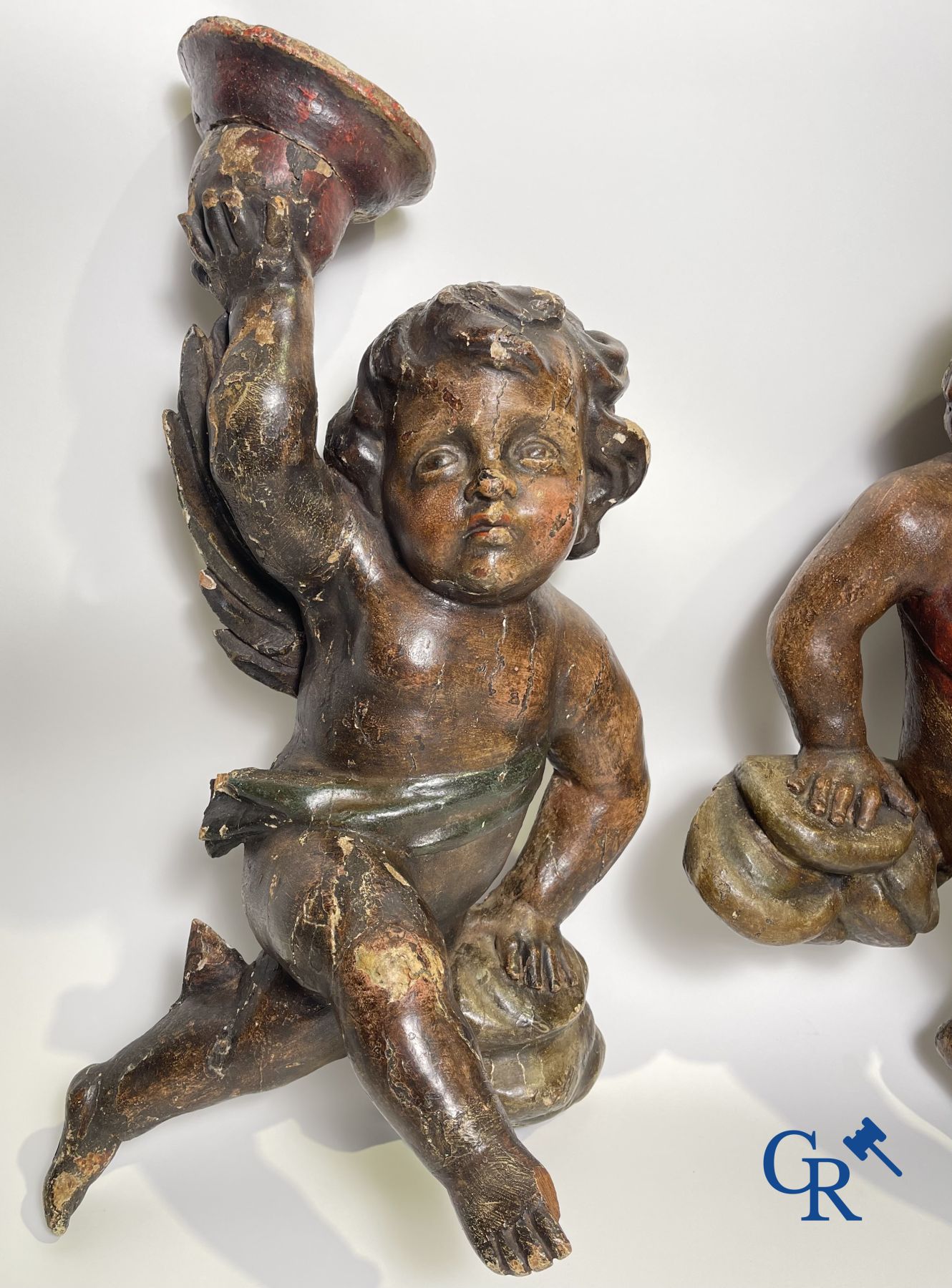 Wooden sculptures: A pair of wood-carved and polychrome 18th century angels.