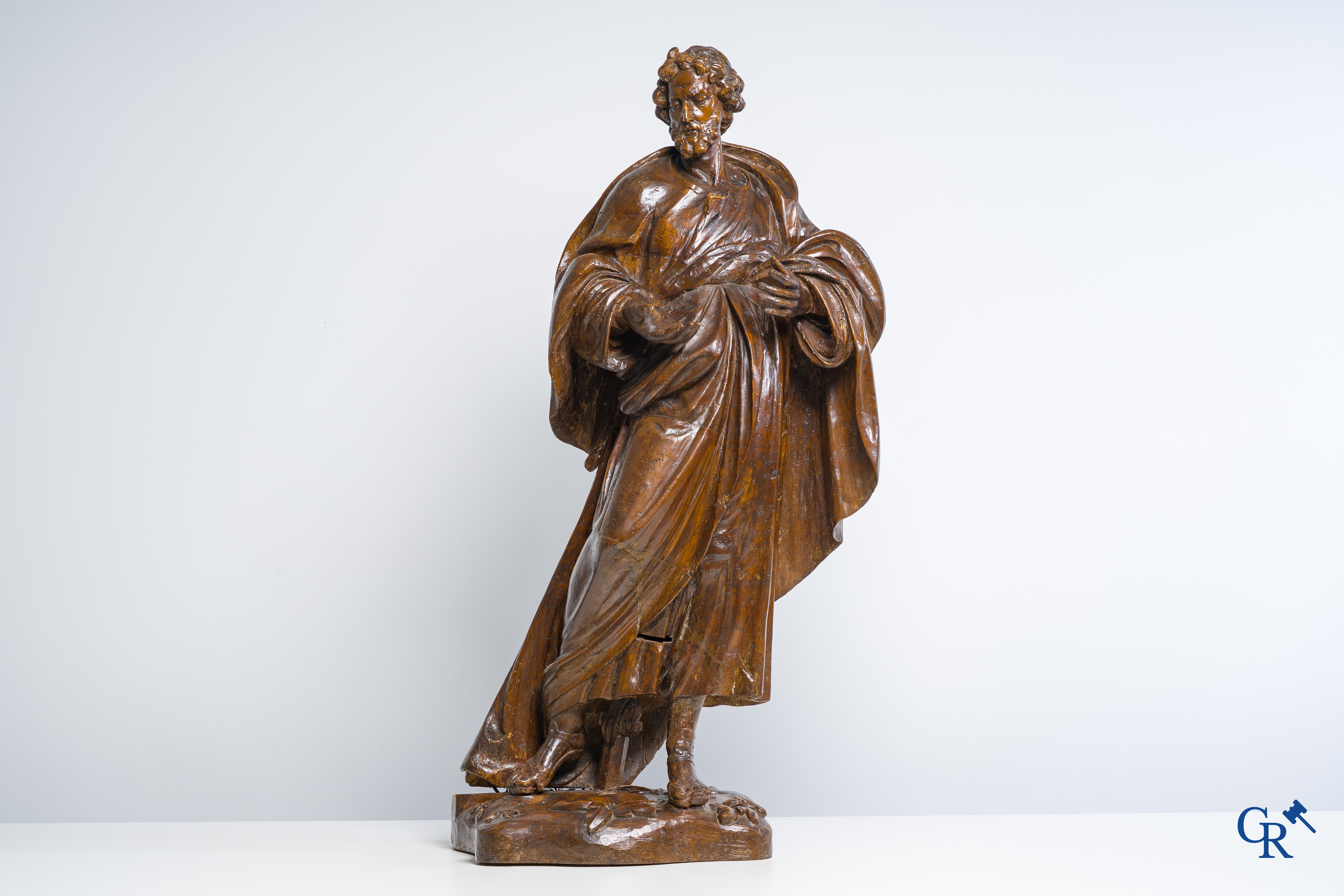 Statue of an apostle in limewood. 17th-18th century.