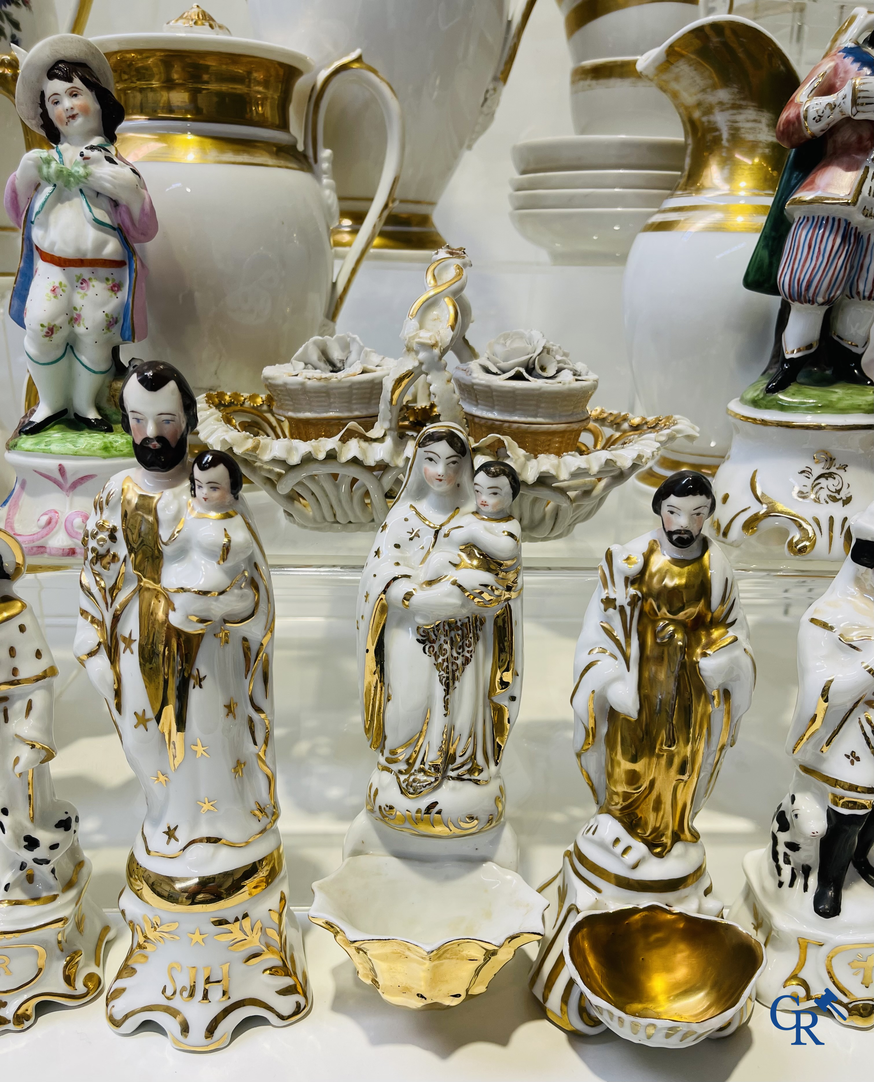 Large lot of holy water vessels, statues of saints, etc. in old Brussels and Paris porcelain. 