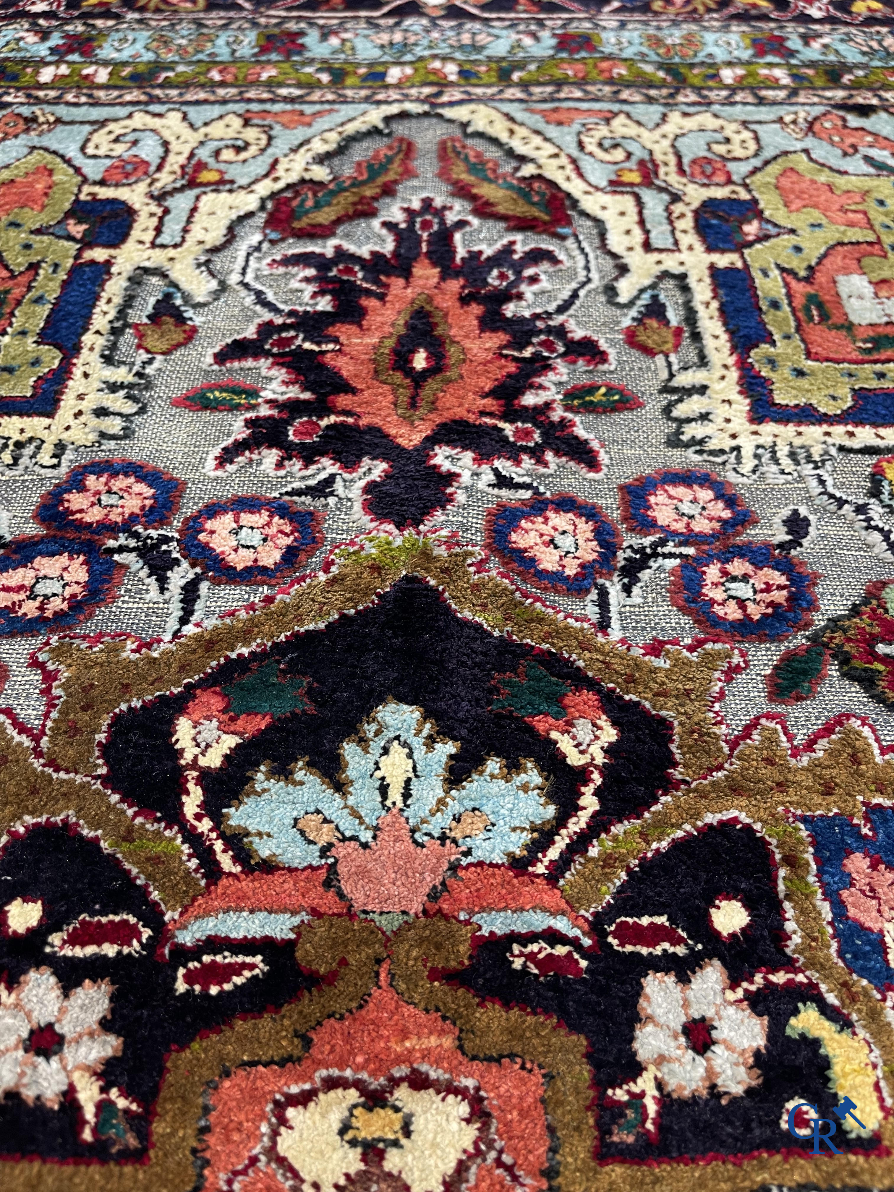 Oriental carpets: Heriz, an exceptionally finely knotted carpet decorated with silver thread.