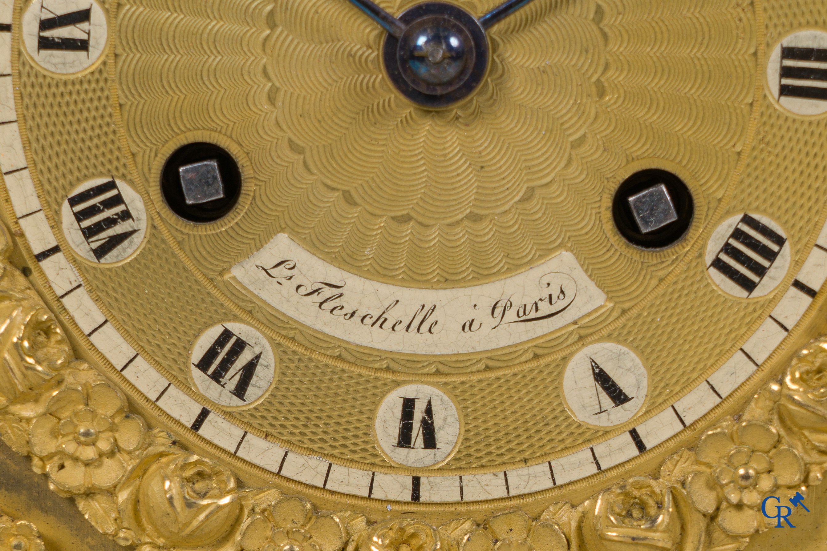 Fleschelle à Paris, richly decorated and finely chiseled clock. Restoration period. 1st half 19th century.