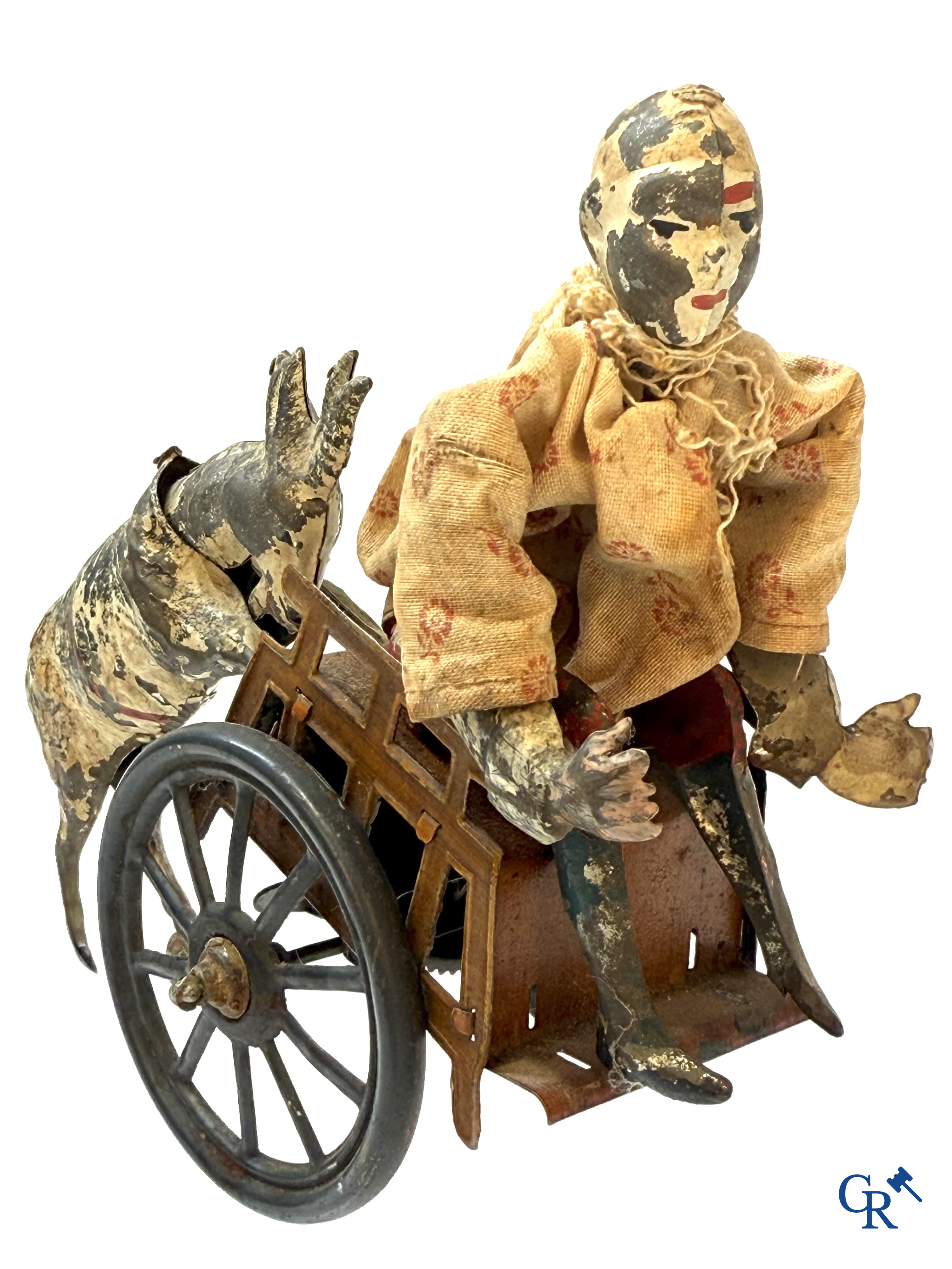 Günthermann. Een pierrot met geit in mechanisch beschilderd blikken speelgoed. Duitsland circa 1910.