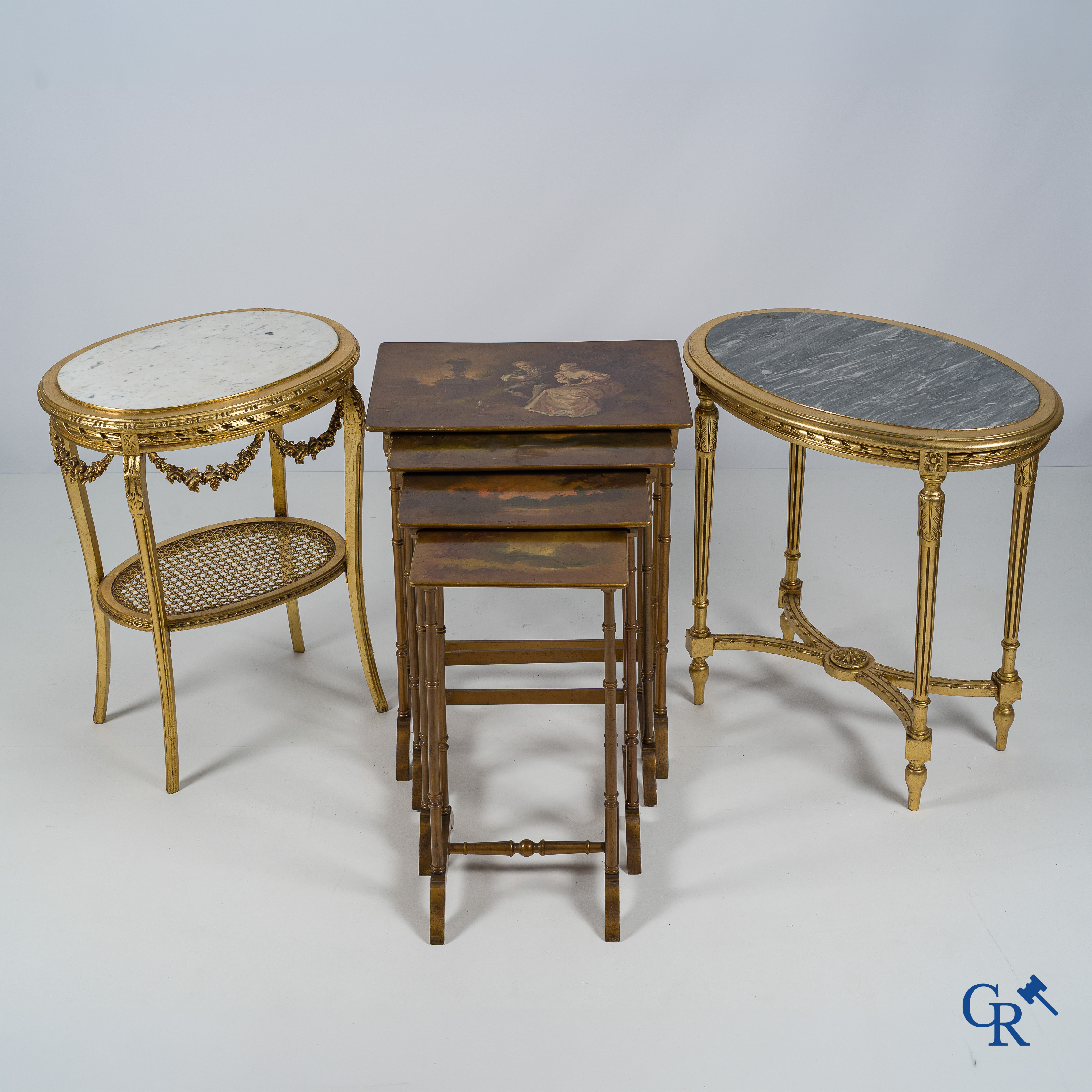 Furniture. 2 gilded geuridons in LXVI style and a set of nesting tables with Varnish Martin painting. Circa 1920.