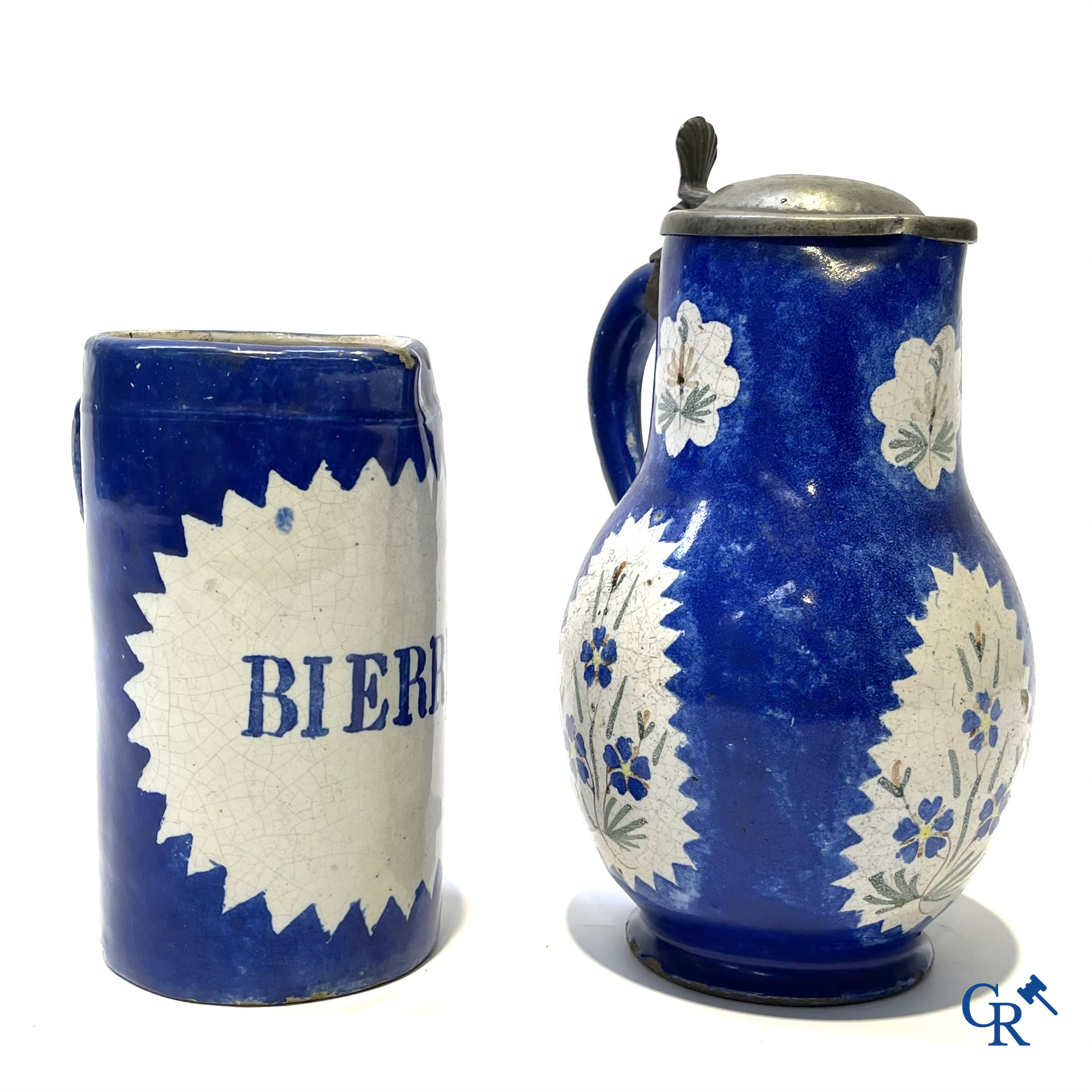 Brussels pottery. 3 jugs with tin lid and a beer jug in decorated Brussels pottery. 18th-19th century.