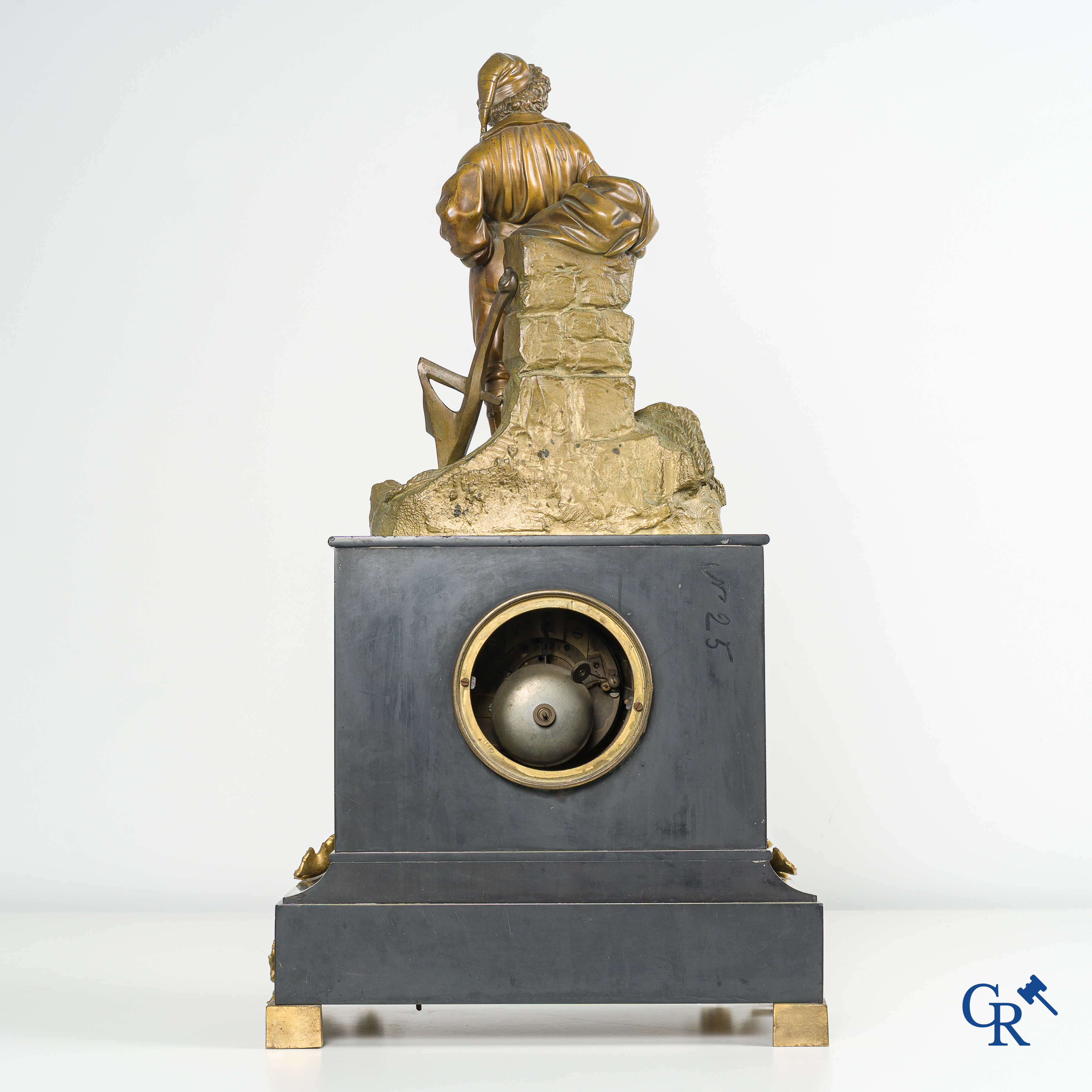 Large fireplace clock in black marble and bronze. Enamelled dial and minute indication. Napoleon III Period.