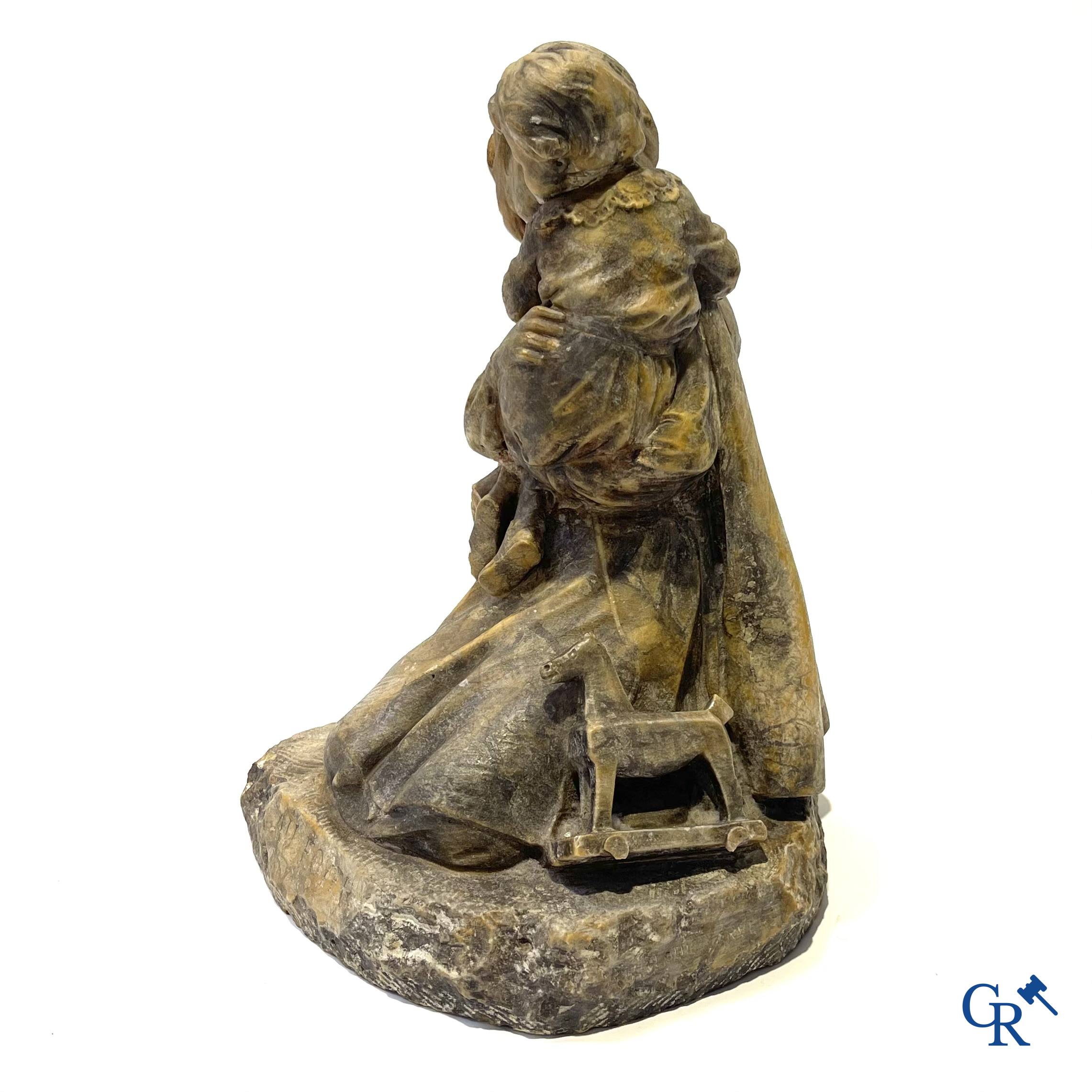 Louis J. Convers (1860-1915) French sculptor. "Au Foyer" Mother with child in sculpted rock. Around 1900.
