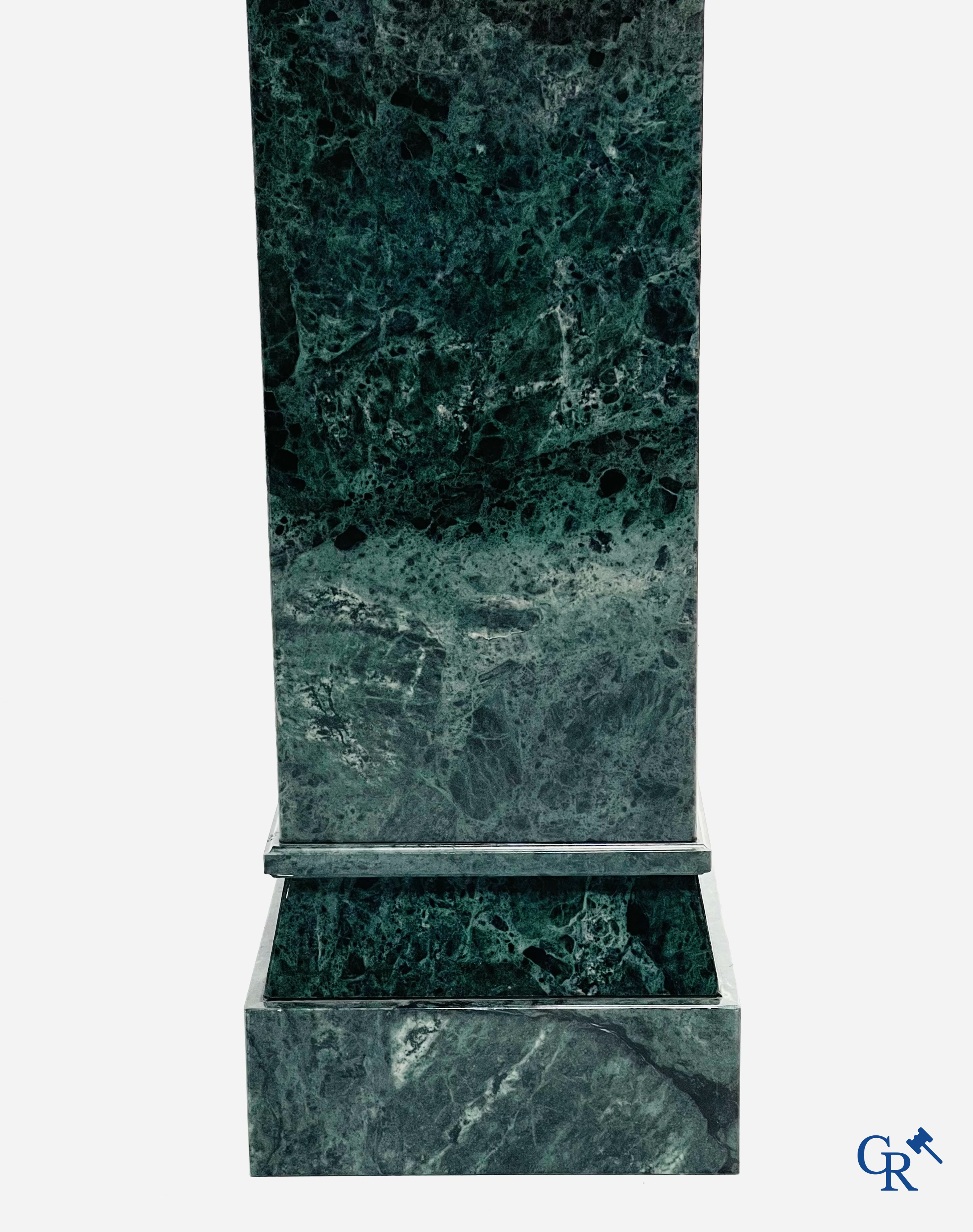 A large pedestal in green marble. 20th century.