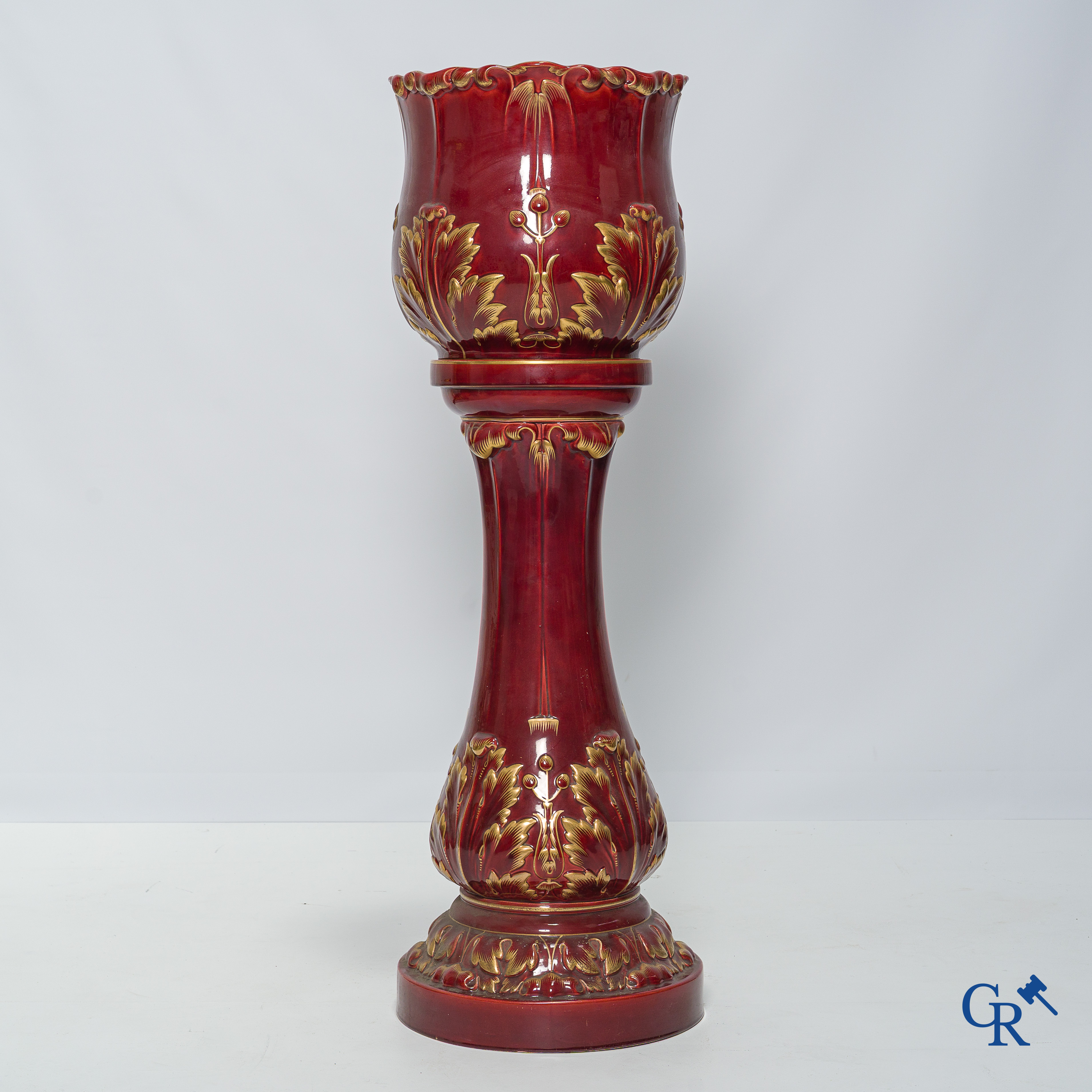 Art Nouveau, Sarreguemines. A jardiniere in enamelled faience or barbotine on his stand. Around 1910.