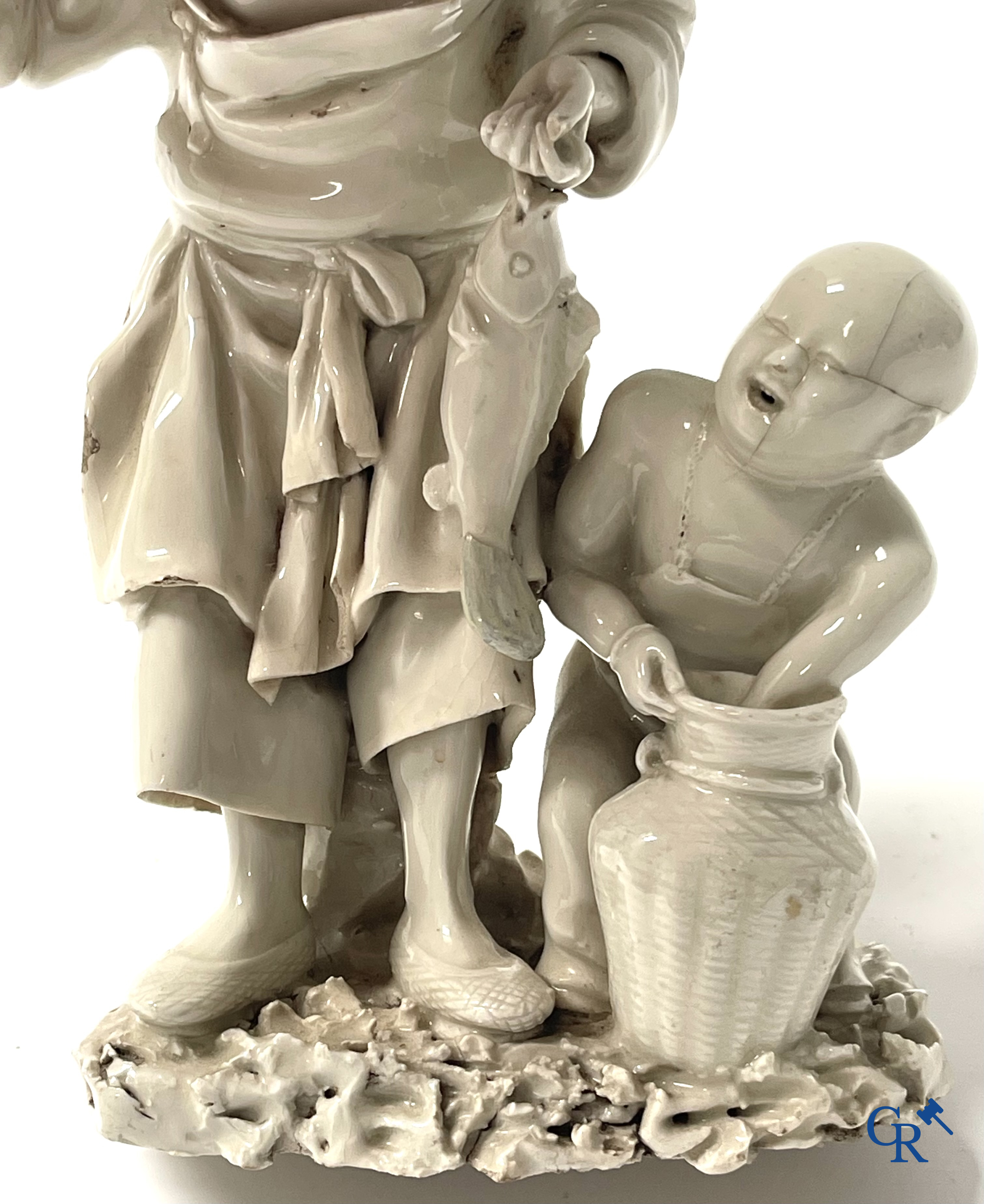 Asian Art. China. A group in blanc de Chine. 18th century.