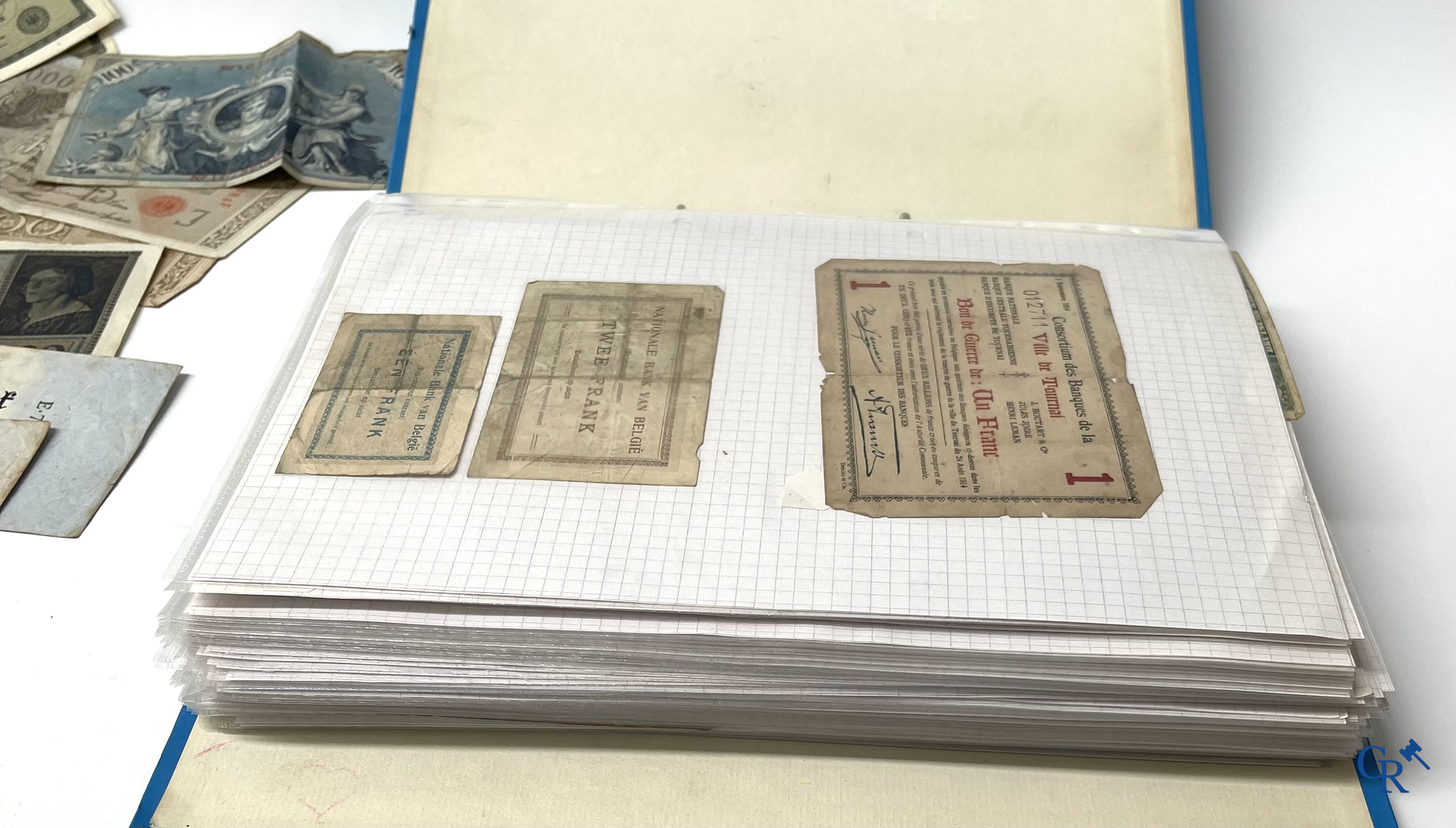Old coins and banknotes. A large collection of old coins and banknotes. Multiple coins in silver.