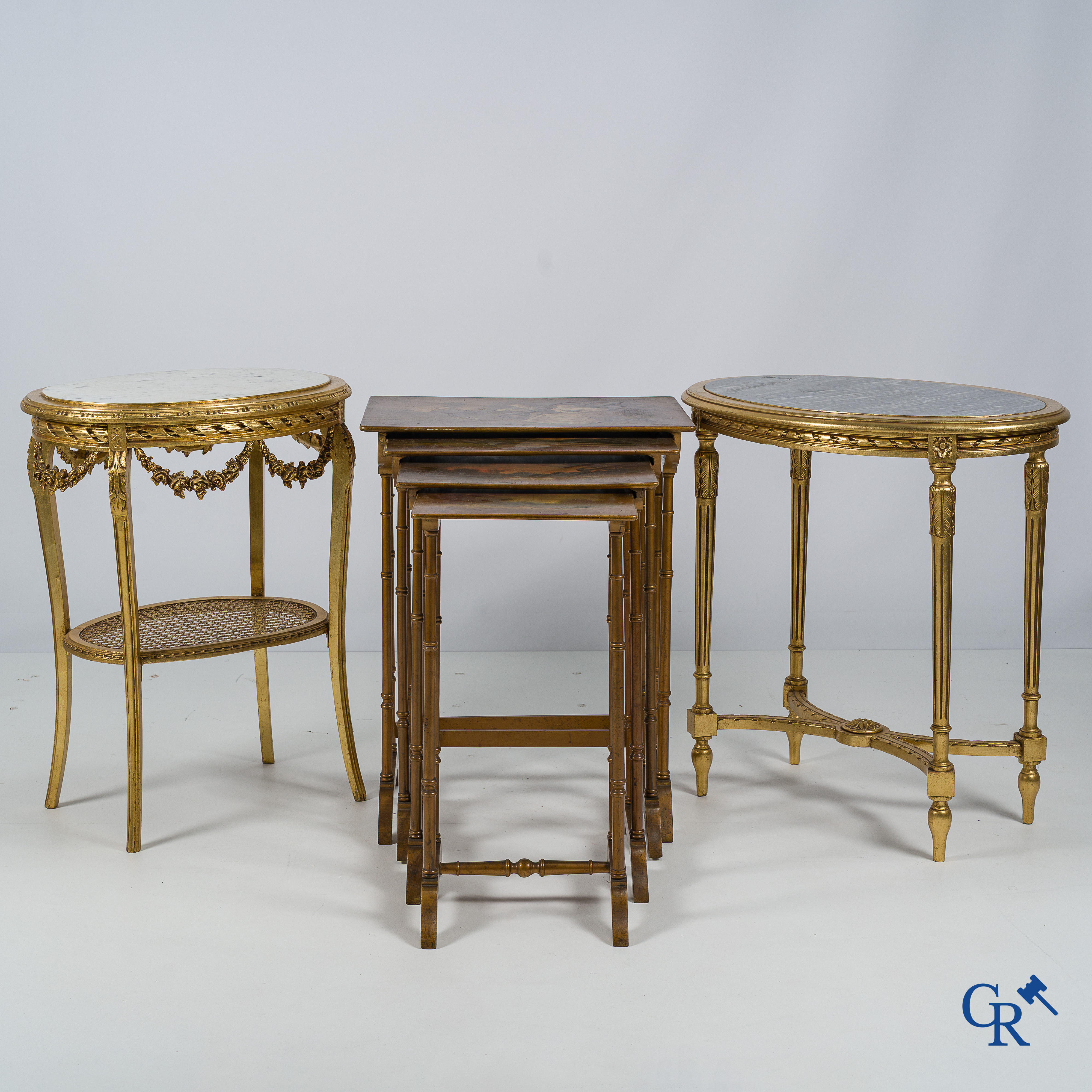 Furniture. 2 gilded geuridons in LXVI style and a set of nesting tables with Varnish Martin painting. Circa 1920.