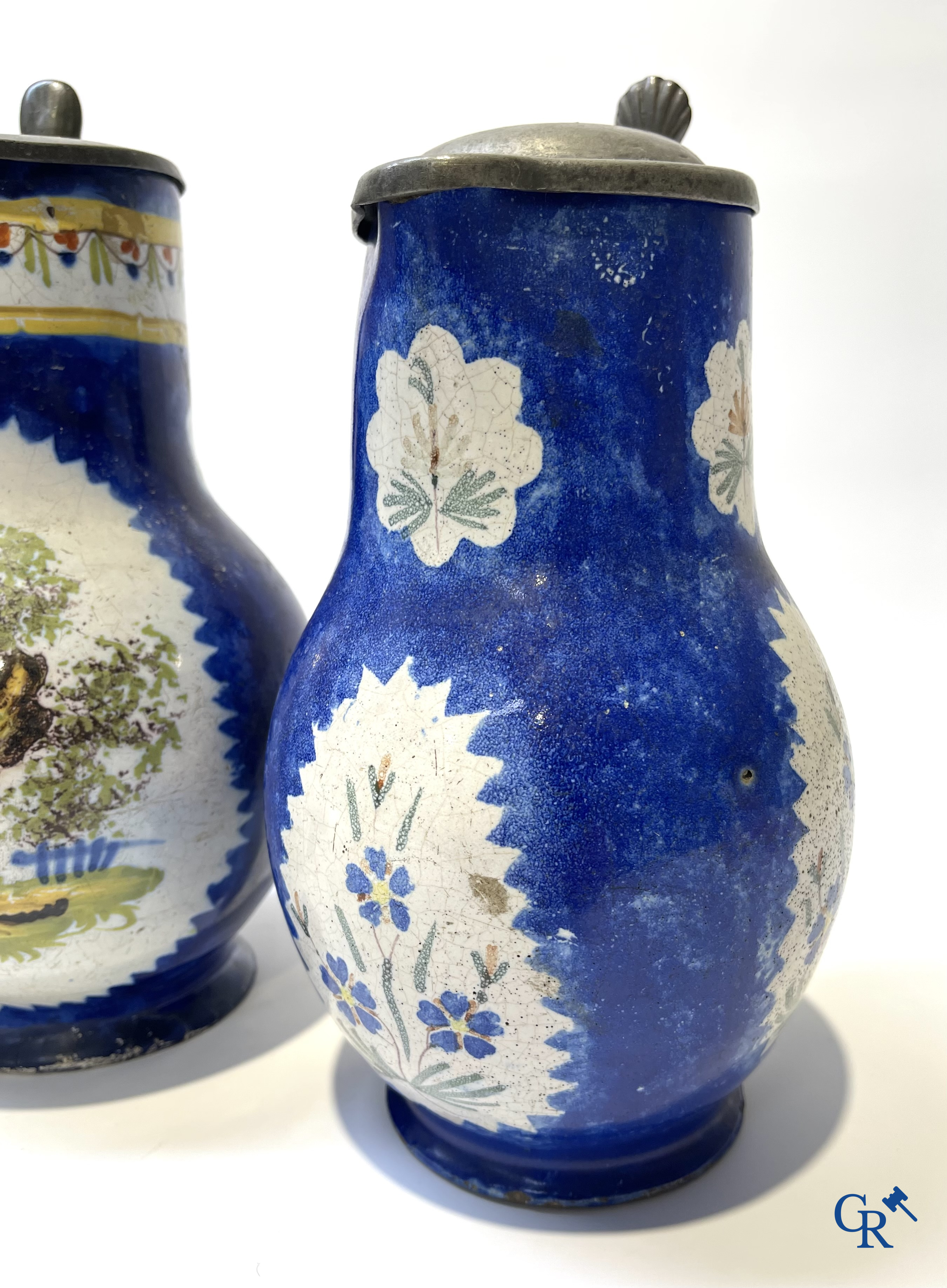 Brussels pottery. 3 jugs with tin lid and a beer jug in decorated Brussels pottery. 18th-19th century.