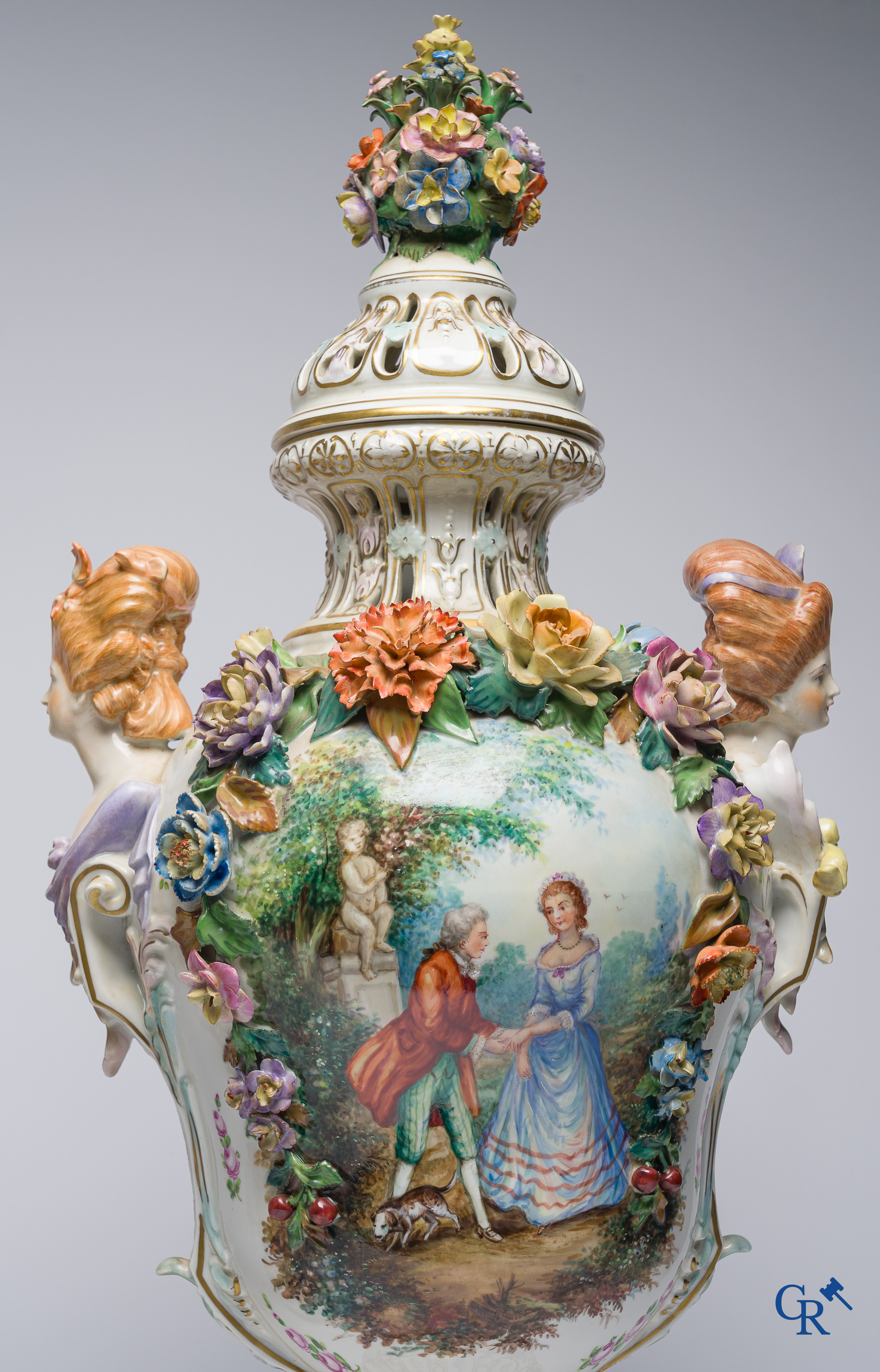Dresden, German porcelain. Pair of large lid vases with romantic scenes. On base. Marked and numbered.
