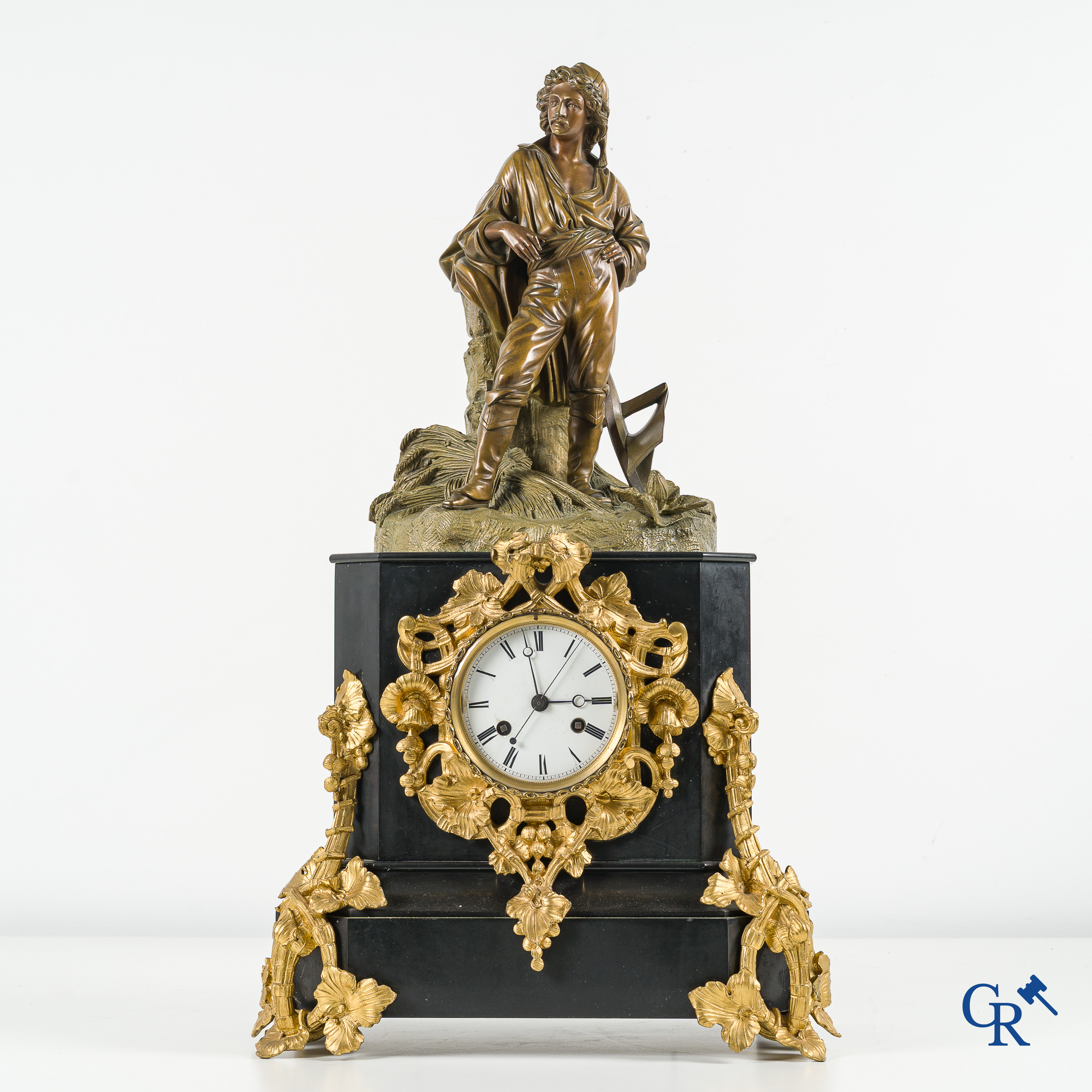 Large fireplace clock in black marble and bronze. Enamelled dial and minute indication. Napoleon III Period.