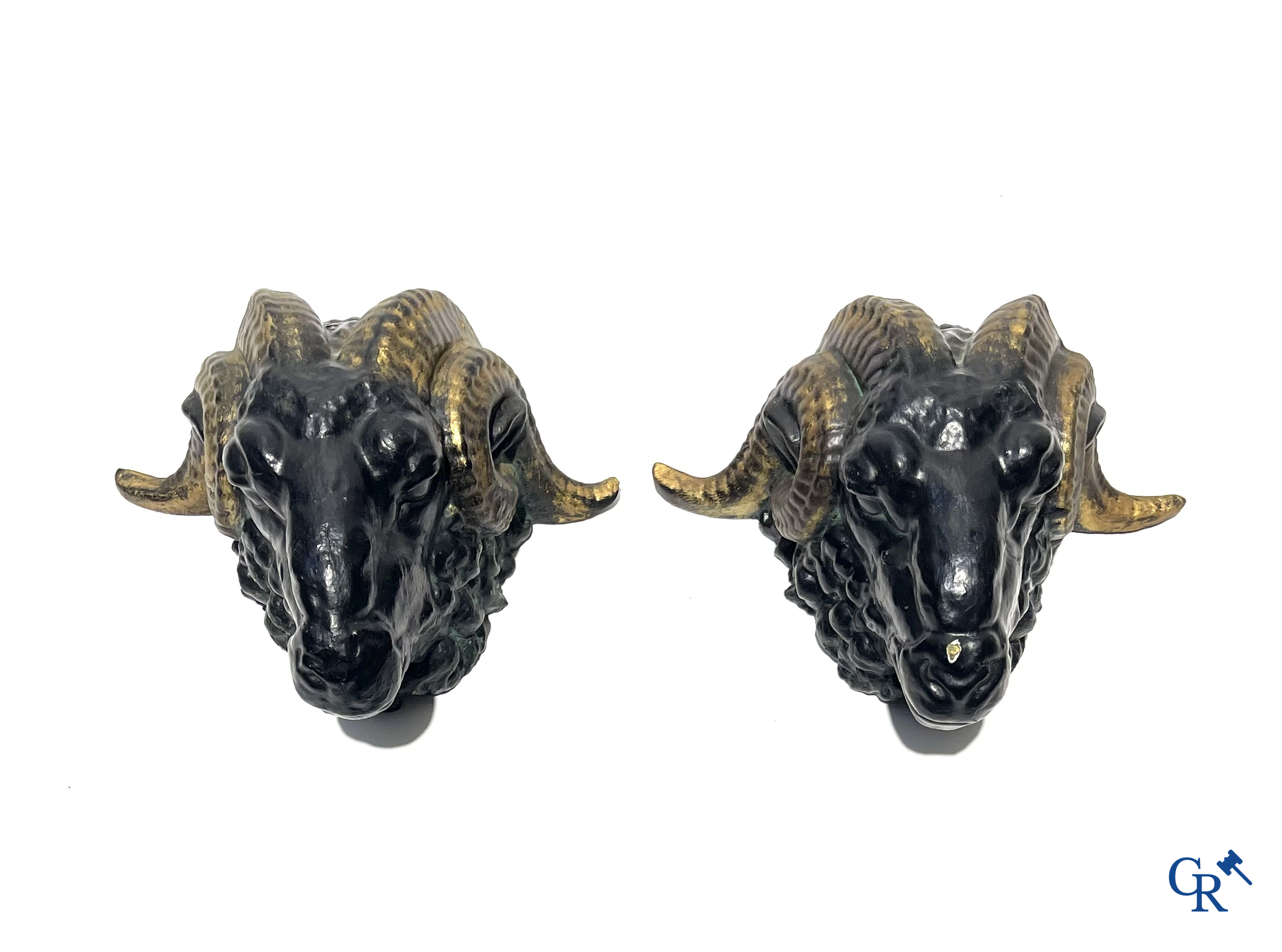 Butchery signboard. Pair of ram heads in zinc serving as façade decoration for a butchery. Circa 1900-1930.