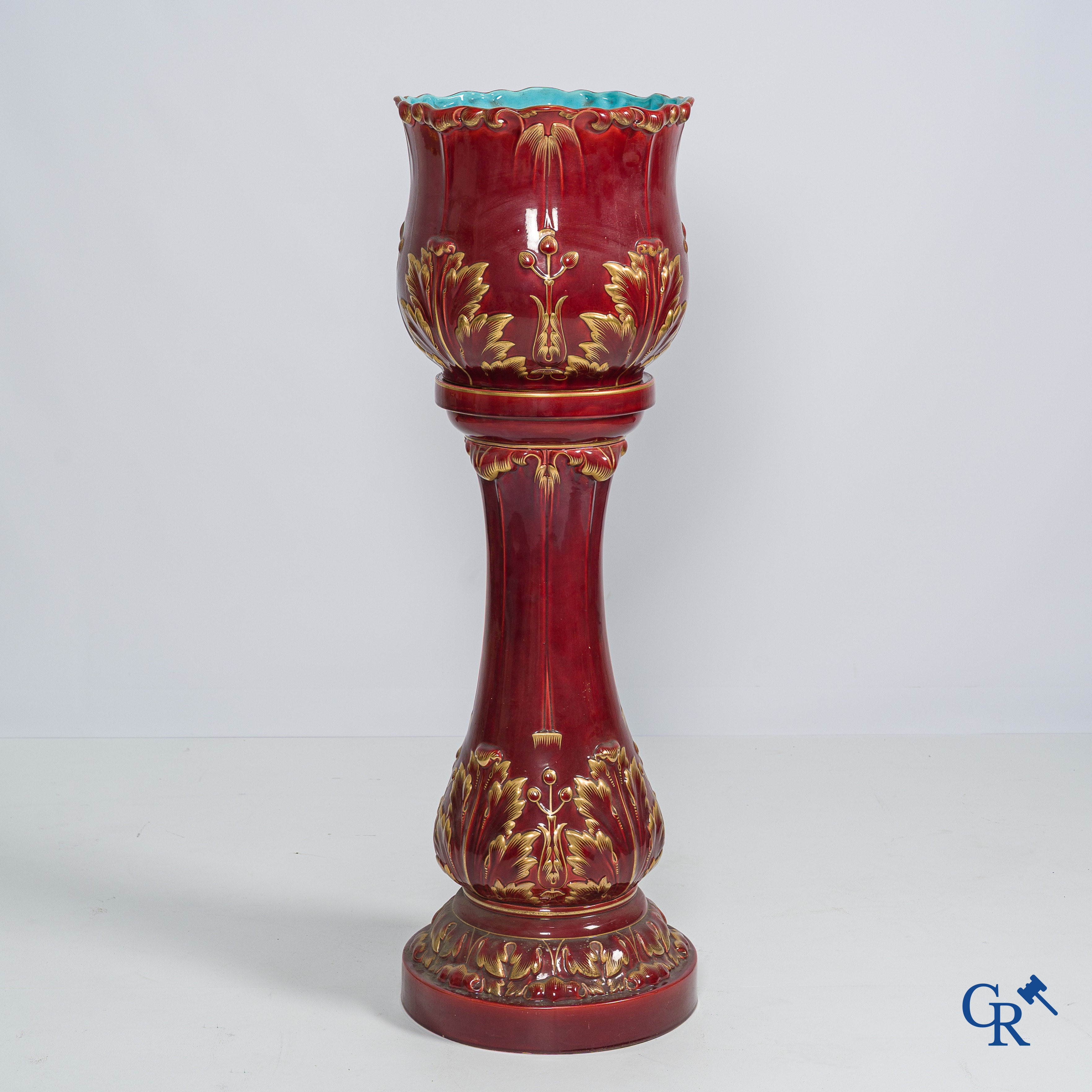 Art Nouveau, Sarreguemines. A jardiniere in enamelled faience or barbotine on his stand. Around 1910.