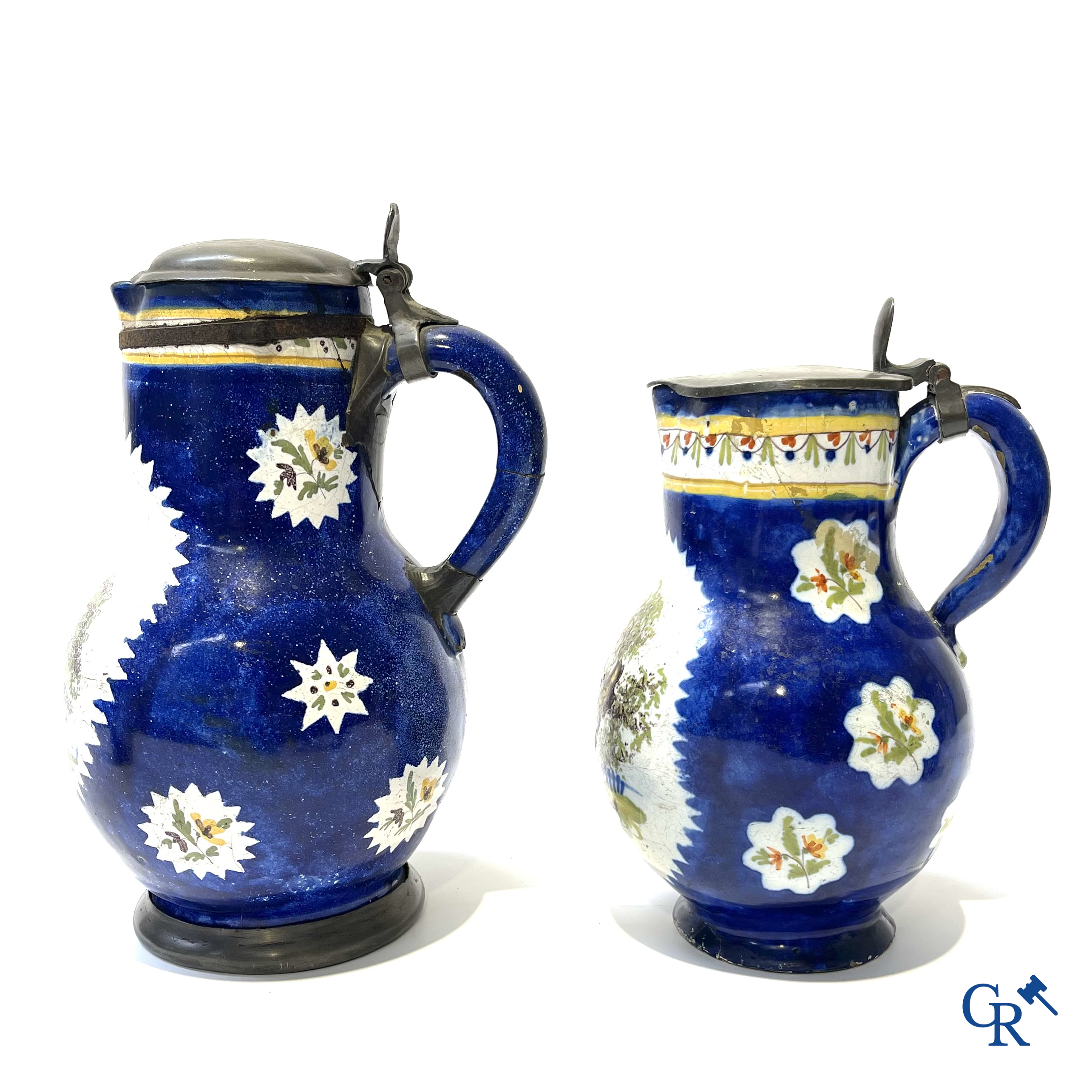 Brussels pottery. 3 jugs with tin lid and a beer jug in decorated Brussels pottery. 18th-19th century.